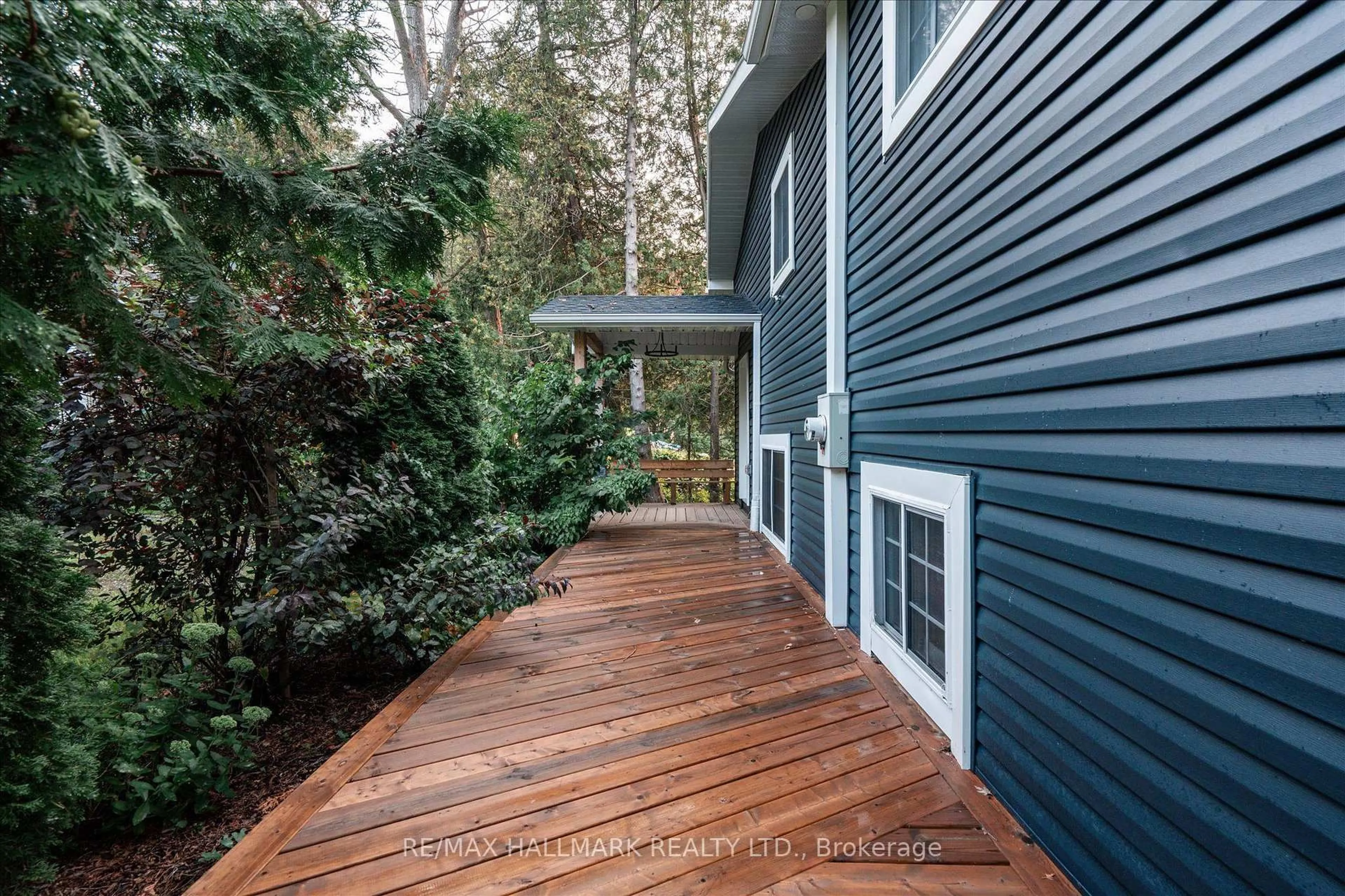 Home with vinyl exterior material, forest/trees view for 5496 Rice Lake Scenic Dr #130, Hamilton Township Ontario K0K 2E0