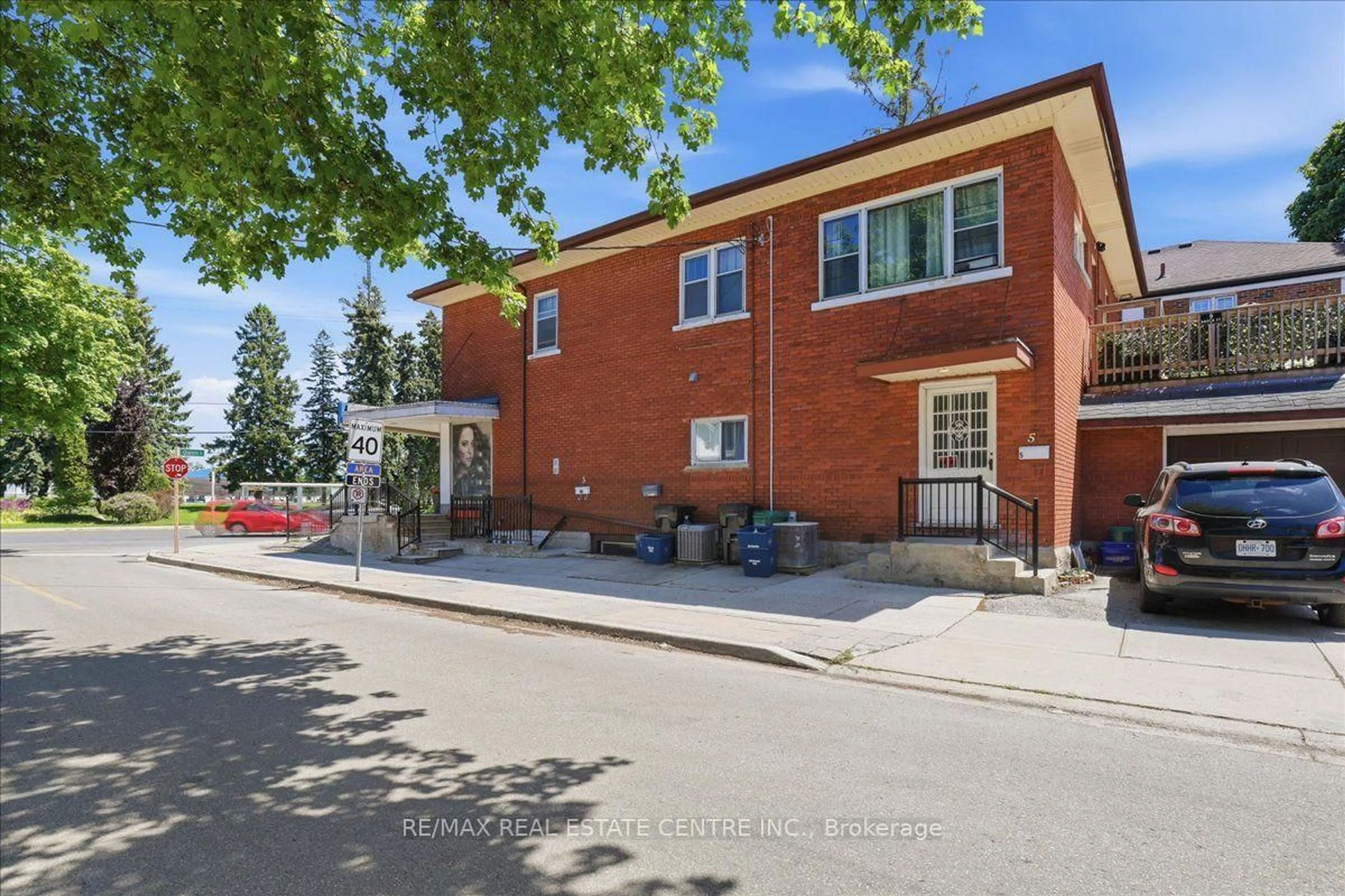 Home with brick exterior material, street for 744 Queen St, Kitchener Ontario N2M 1A4