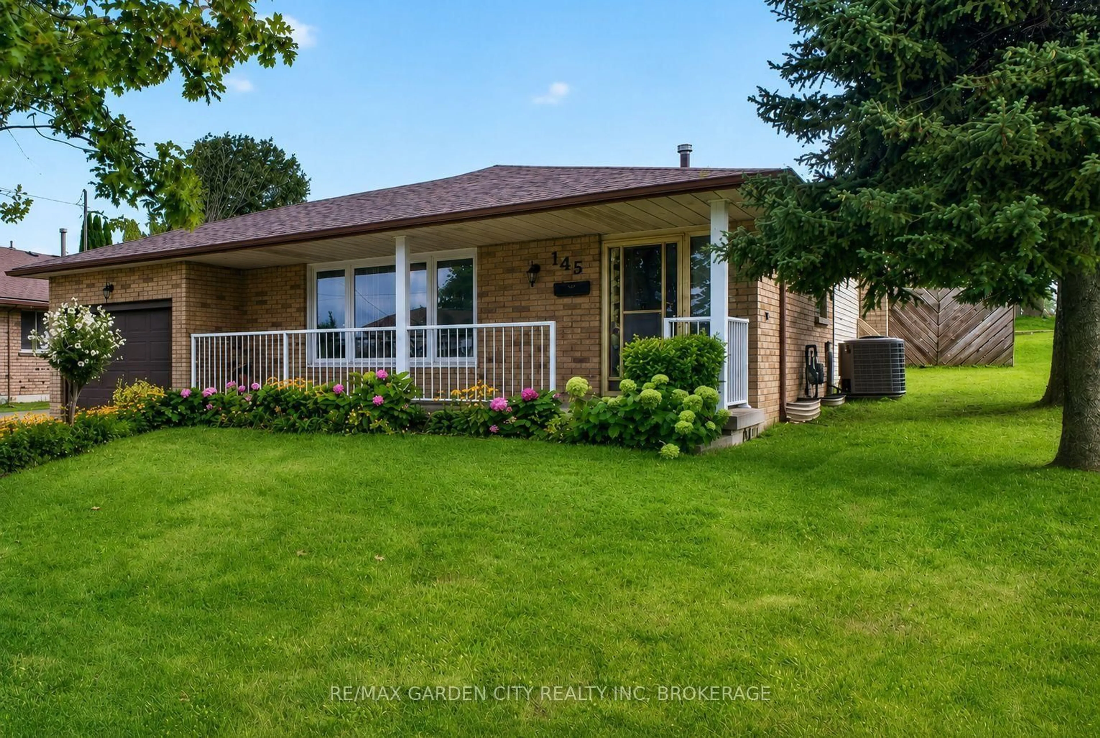 Home with brick exterior material, street for 145 Adis Ave, Hamilton Ontario L9C 6T9