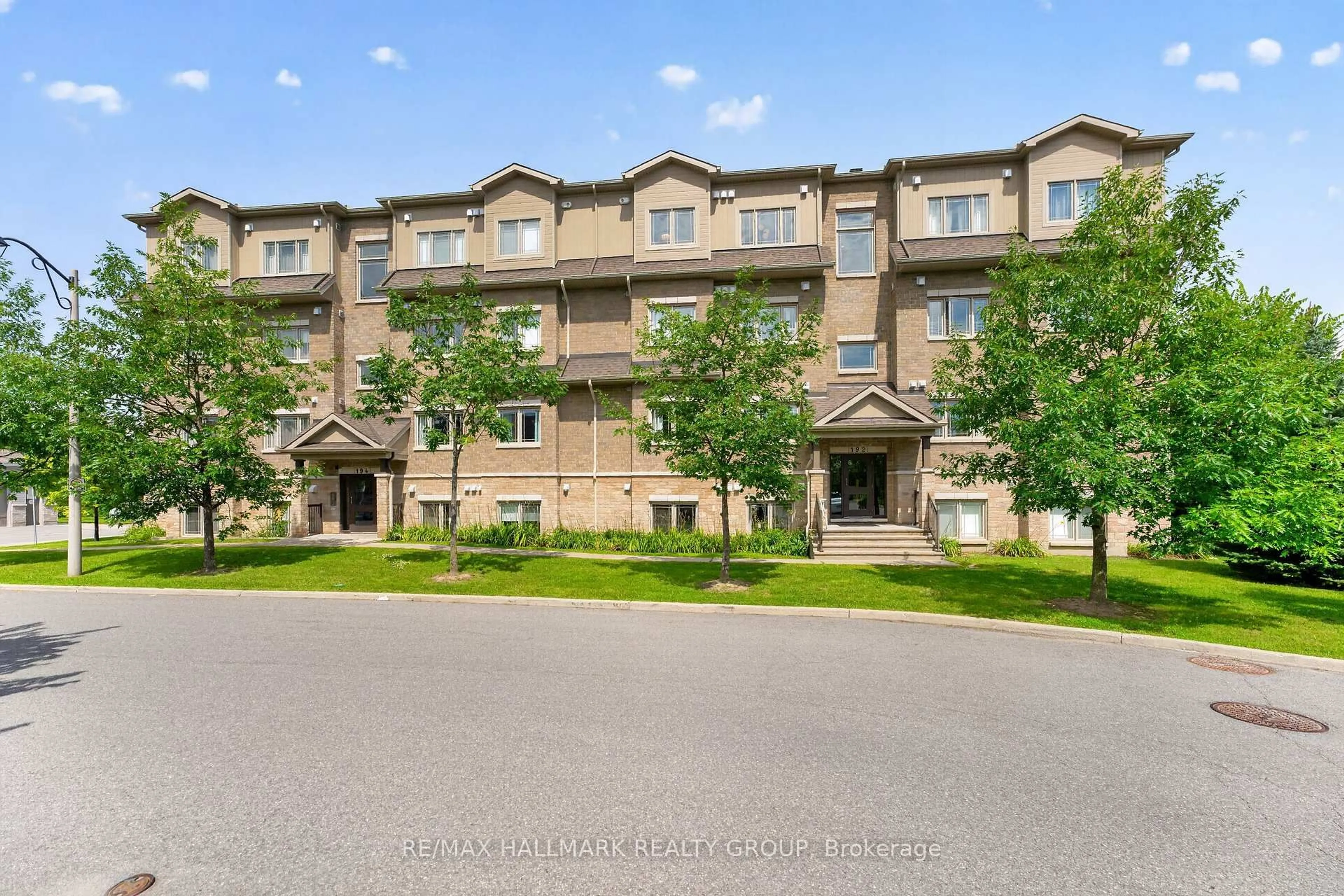 A pic from outside/outdoor area/front of a property/back of a property/a pic from drone, unknown for 192 Springbeauty Ave #7, Ottawa Ontario K2J 6B4
