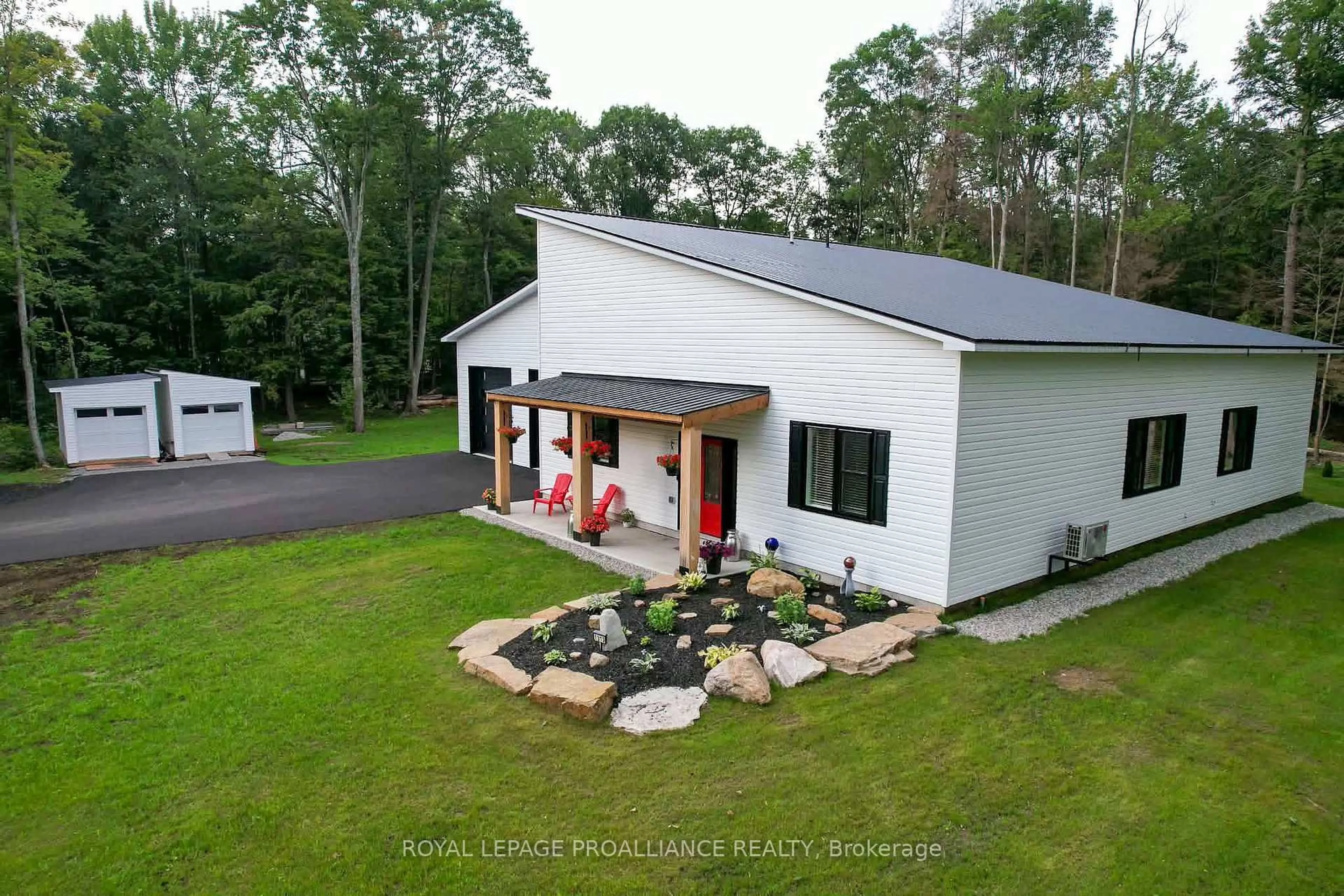 A pic from outside/outdoor area/front of a property/back of a property/a pic from drone, building for 1313 Lily Bay Dr, Elizabethtown-Kitley Ontario K6V 7C5