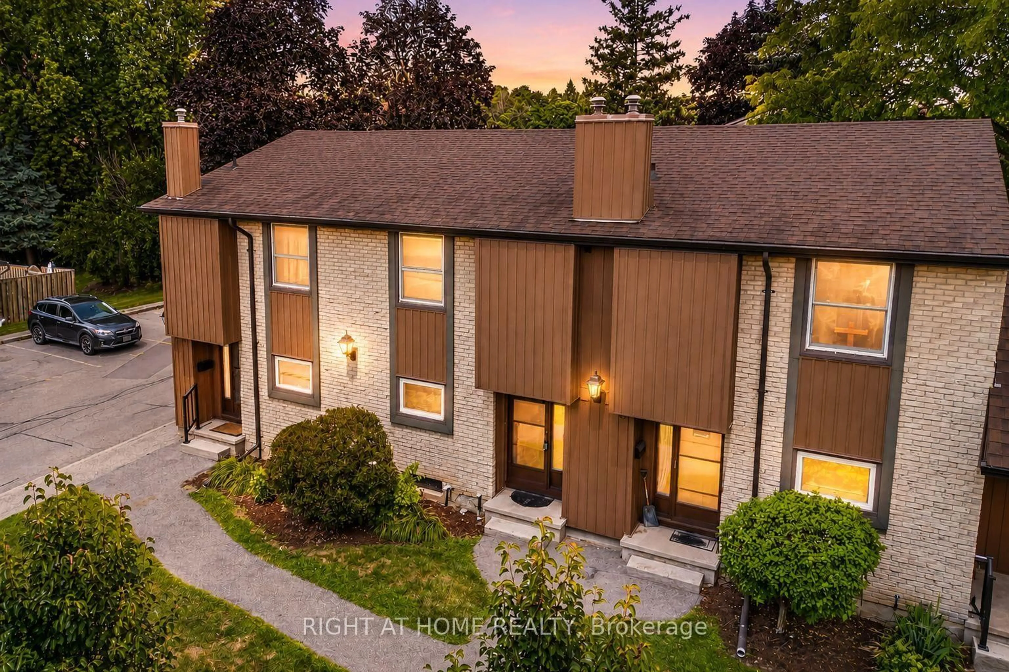 A pic from outside/outdoor area/front of a property/back of a property/a pic from drone, street for 215 Glamis Rd #11, Cambridge Ontario N1R 6V8