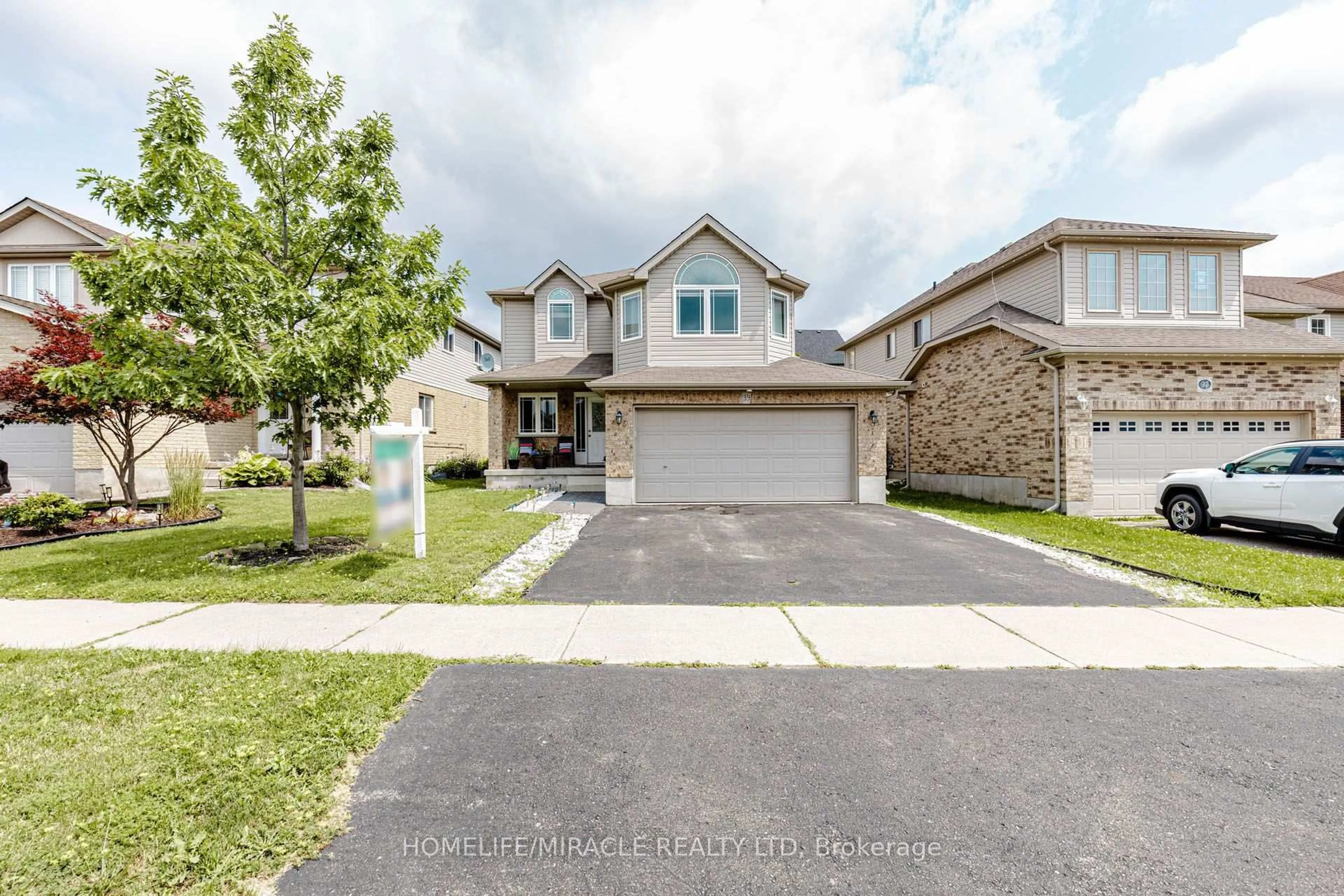 A pic from outside/outdoor area/front of a property/back of a property/a pic from drone, street for 39 Washburn Dr, Guelph Ontario N1E 0B6