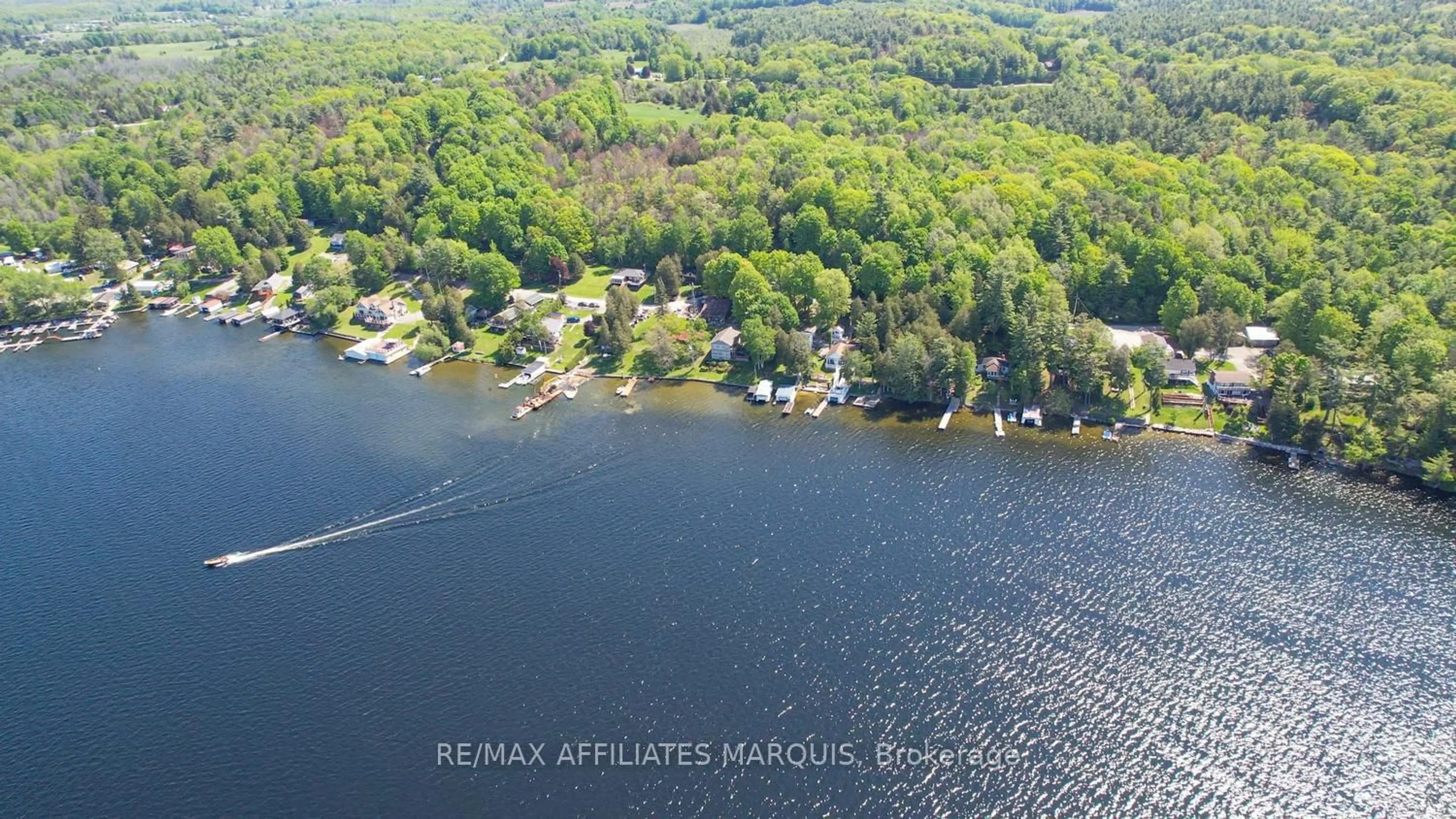 A pic from outside/outdoor area/front of a property/back of a property/a pic from drone, water/lake/river/ocean view for 740 Cedar Park Lane, Athens Ontario K0E 1B0