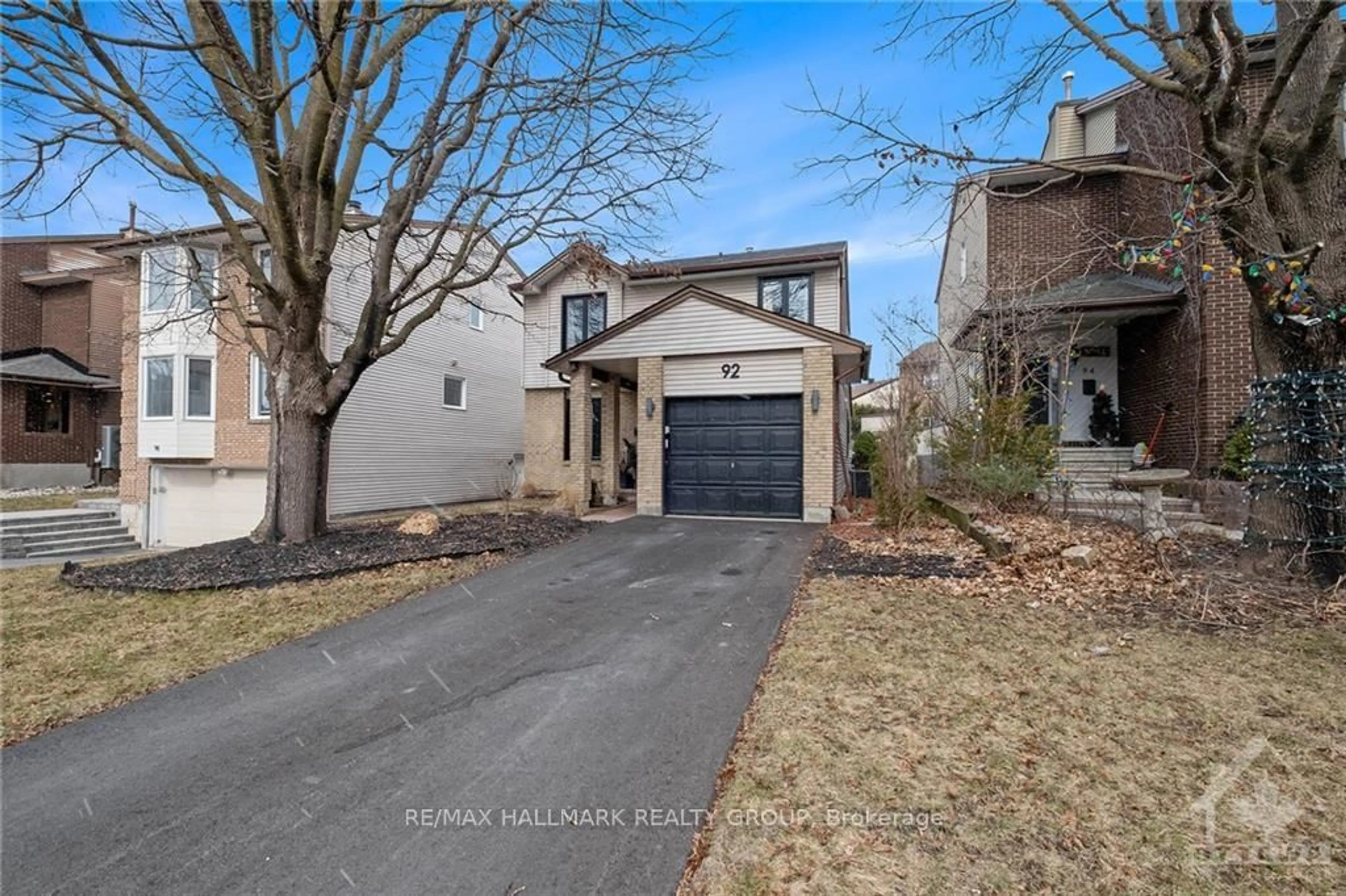 Home with brick exterior material, street for 92 GILLESPIE Cres, Ottawa Ontario K1V 0J2
