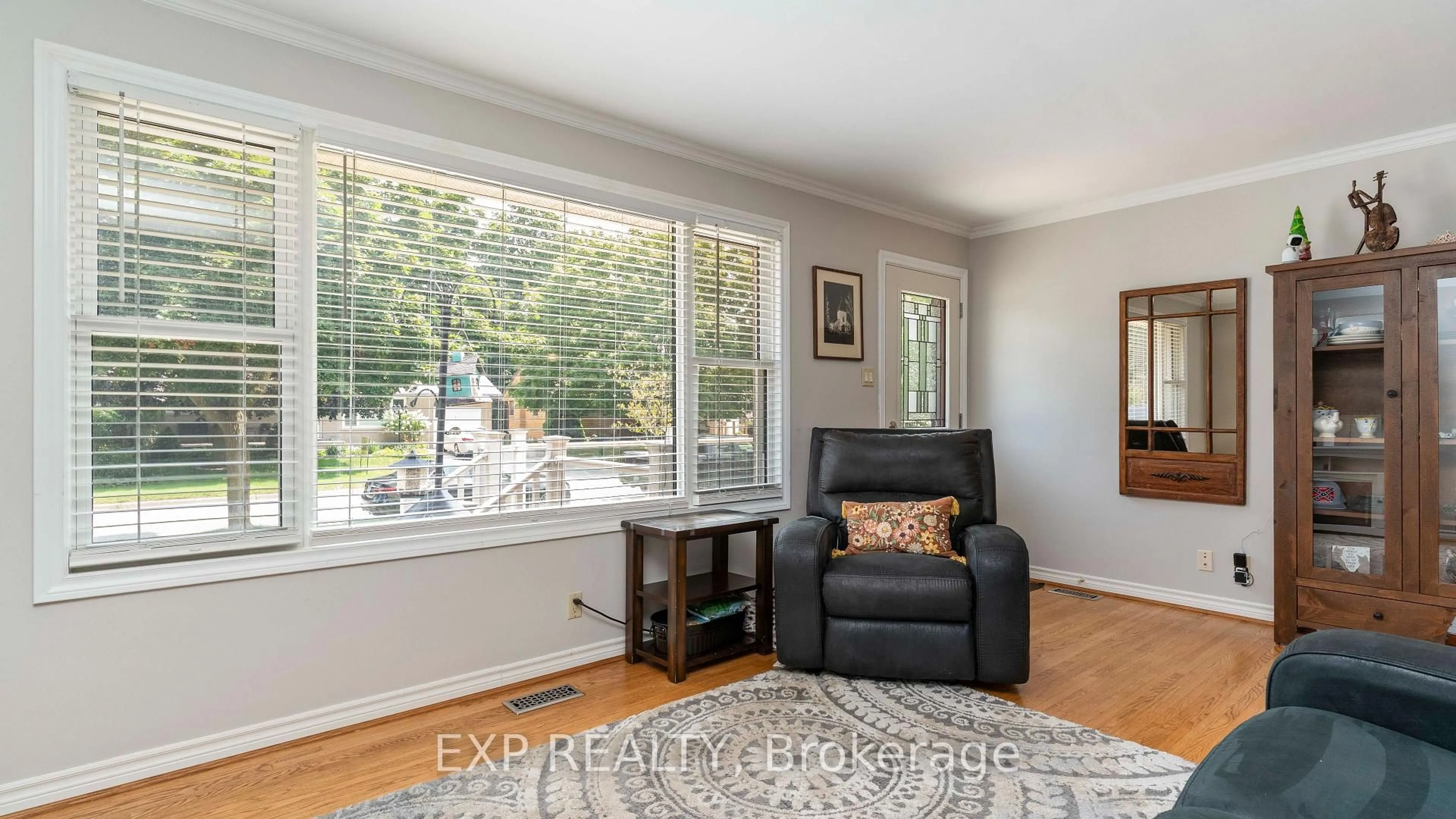 Living room with furniture, wood/laminate floor for 295 Tweedsmuir Ave, London East Ontario N5W 1L5