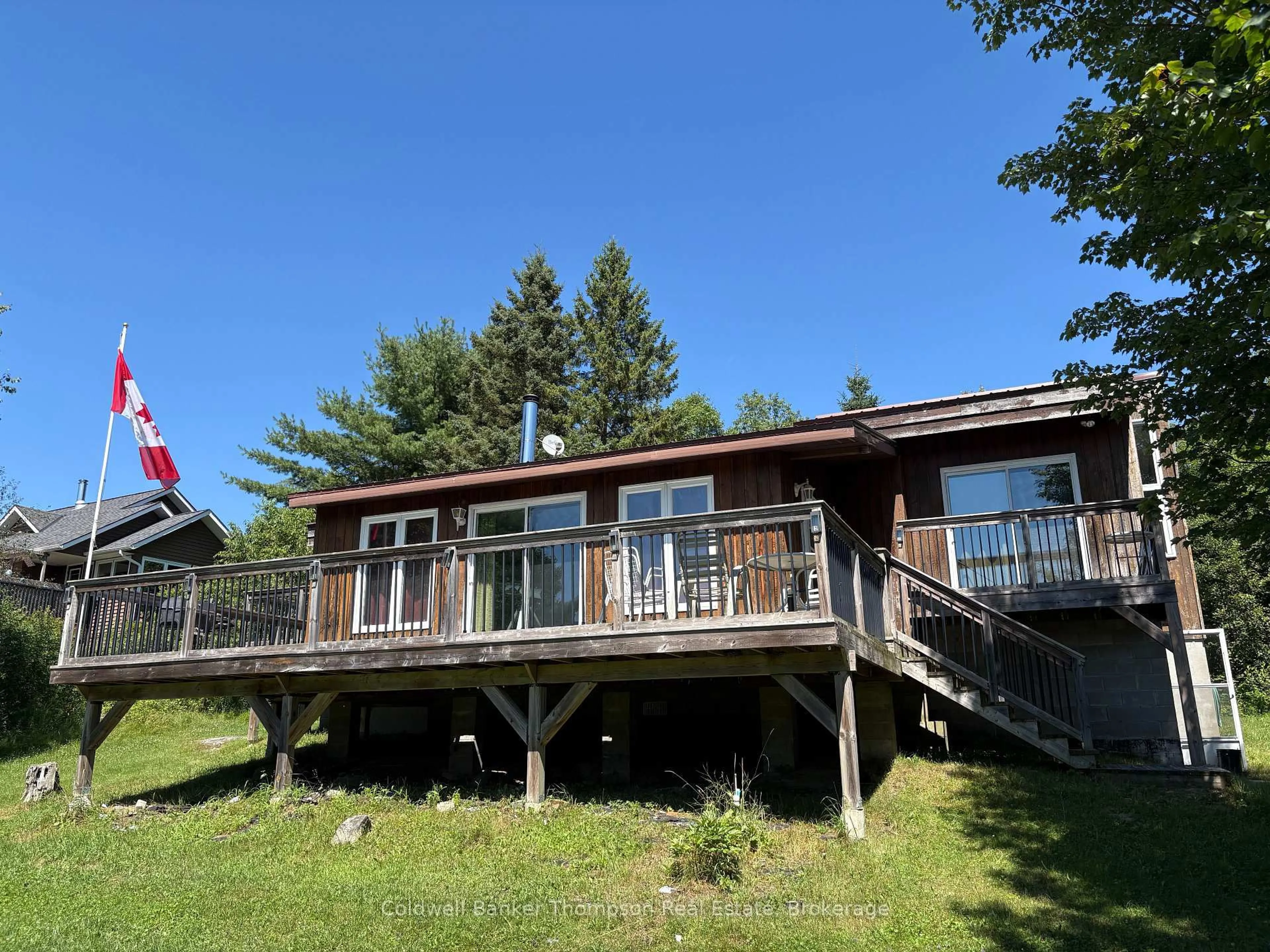 A pic from outside/outdoor area/front of a property/back of a property/a pic from drone, water/lake/river/ocean view for 109 Patrick St, Magnetawan Ontario P0A 1P0