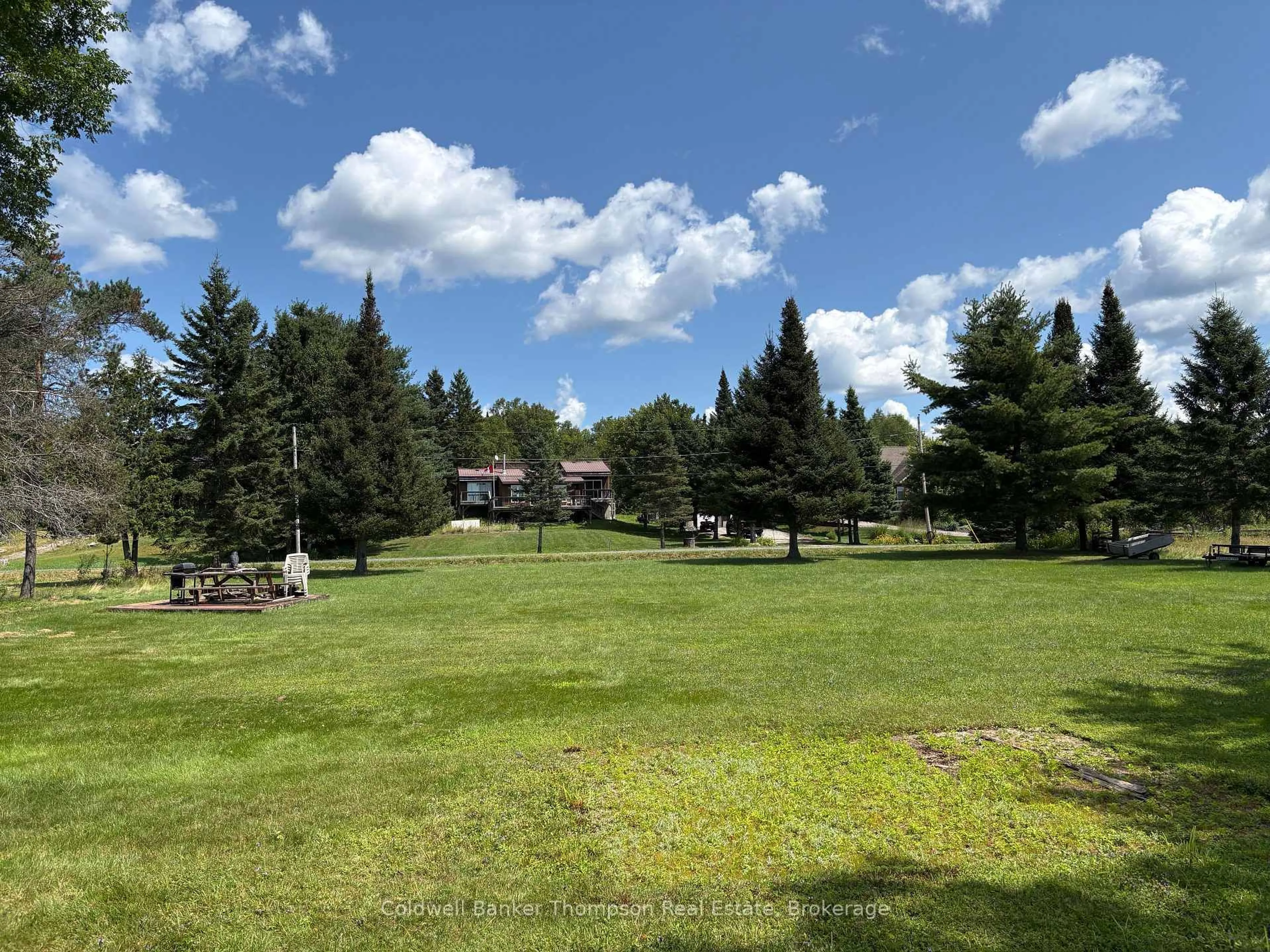 A pic from outside/outdoor area/front of a property/back of a property/a pic from drone, mountain view for 109 Patrick St, Magnetawan Ontario P0A 1P0