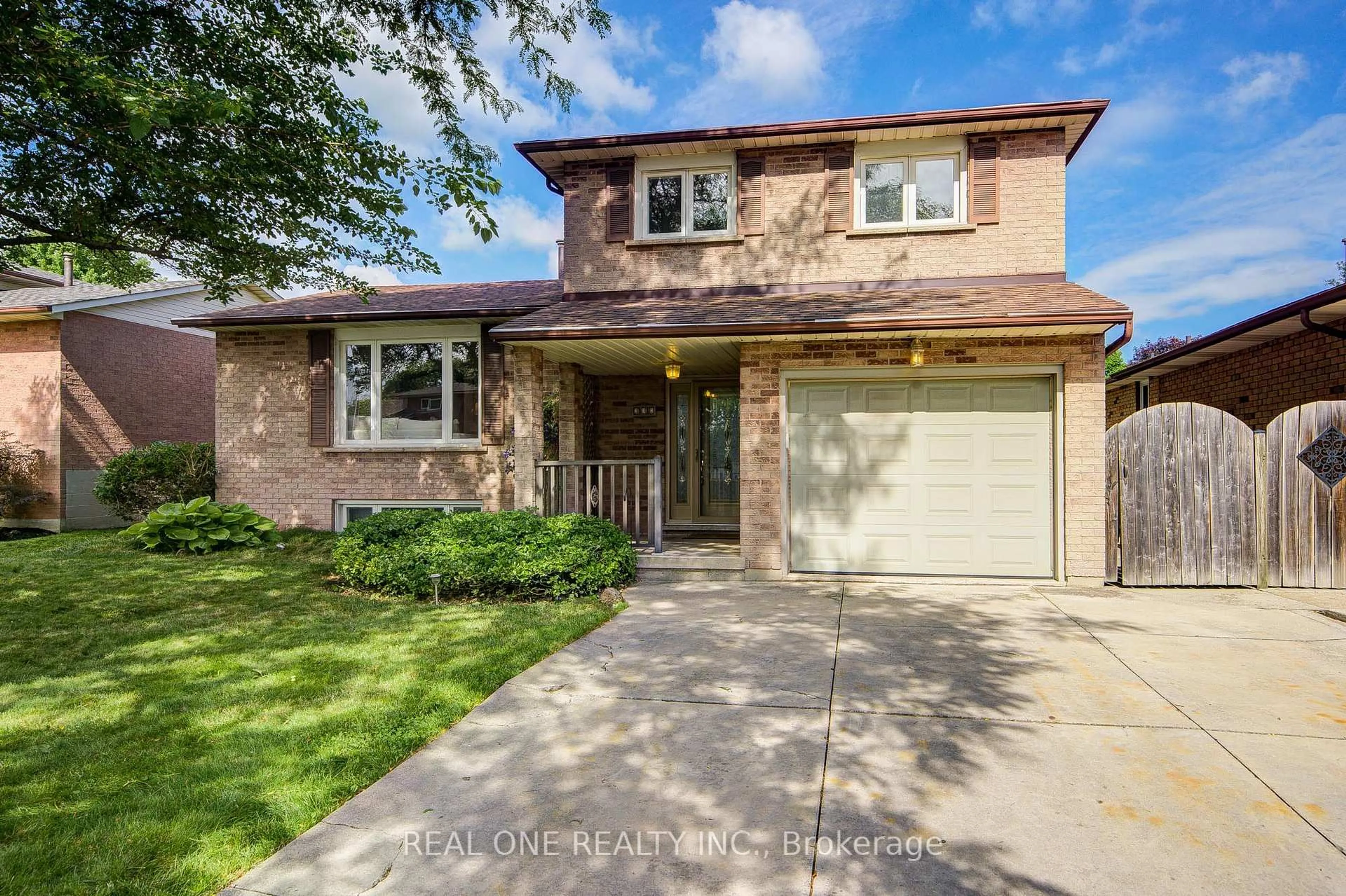 Home with brick exterior material, street for 232 Clifton Downs Rd, Hamilton Ontario L9C 1B5