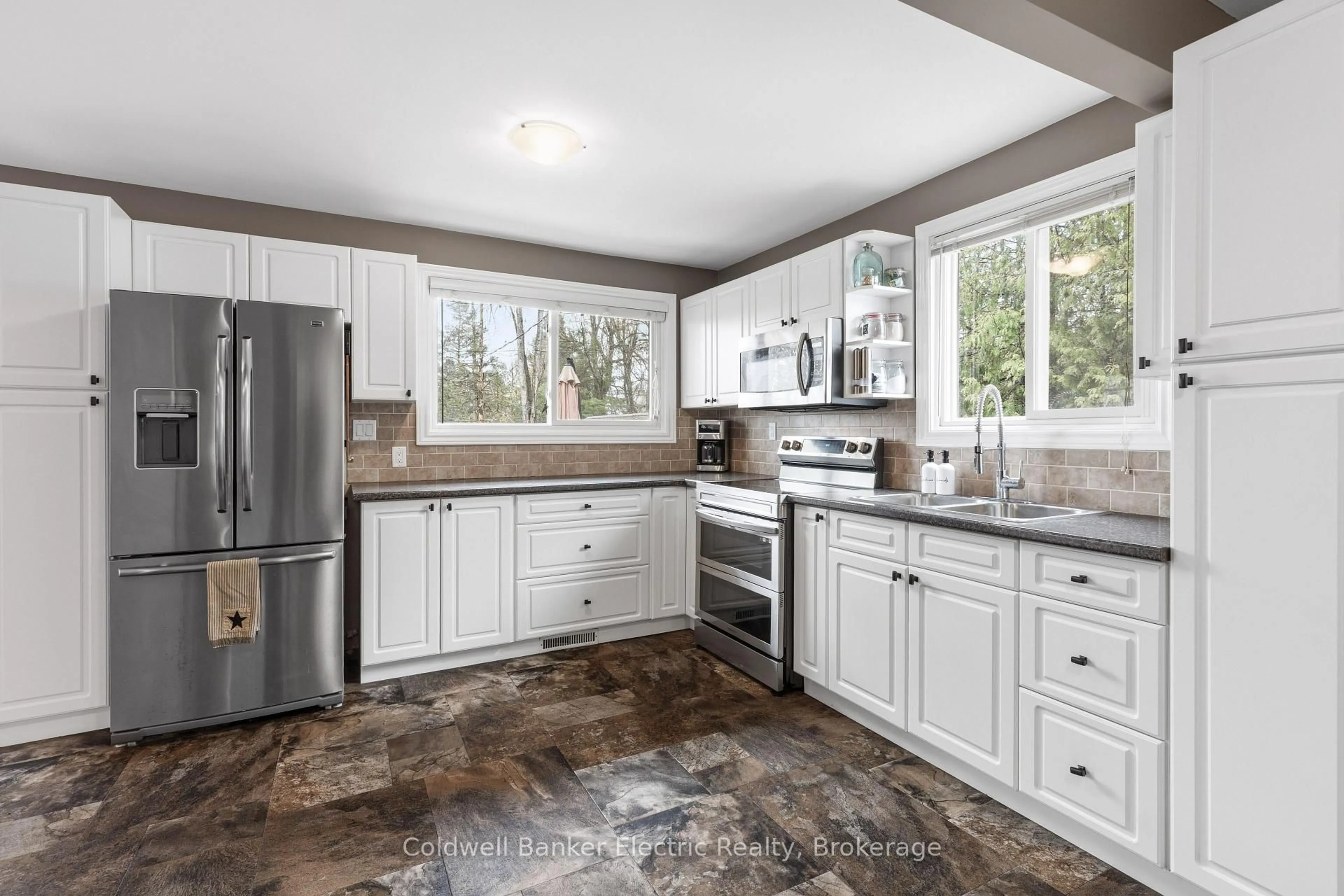 Open concept kitchen, ceramic/tile floor for 30 Woods Ave, Kawartha Lakes Ontario K0L 2W0