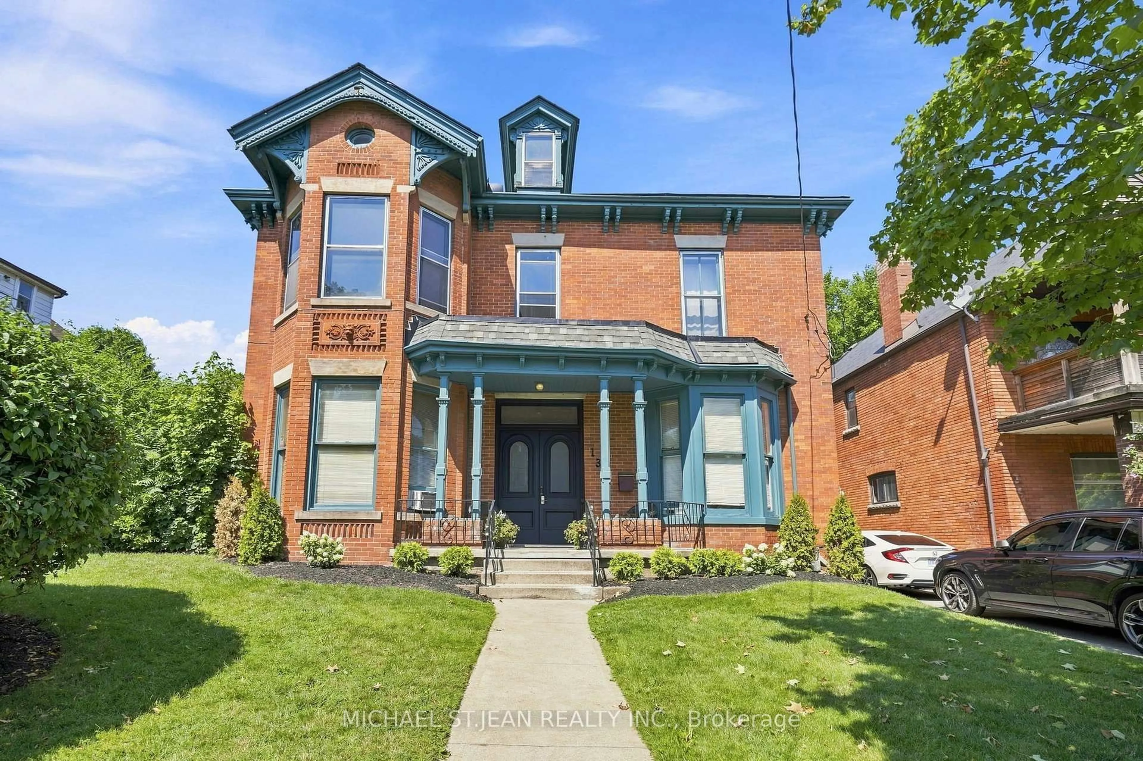 Home with brick exterior material, street for 132 Emerald St, Hamilton Ontario L8N 2V5