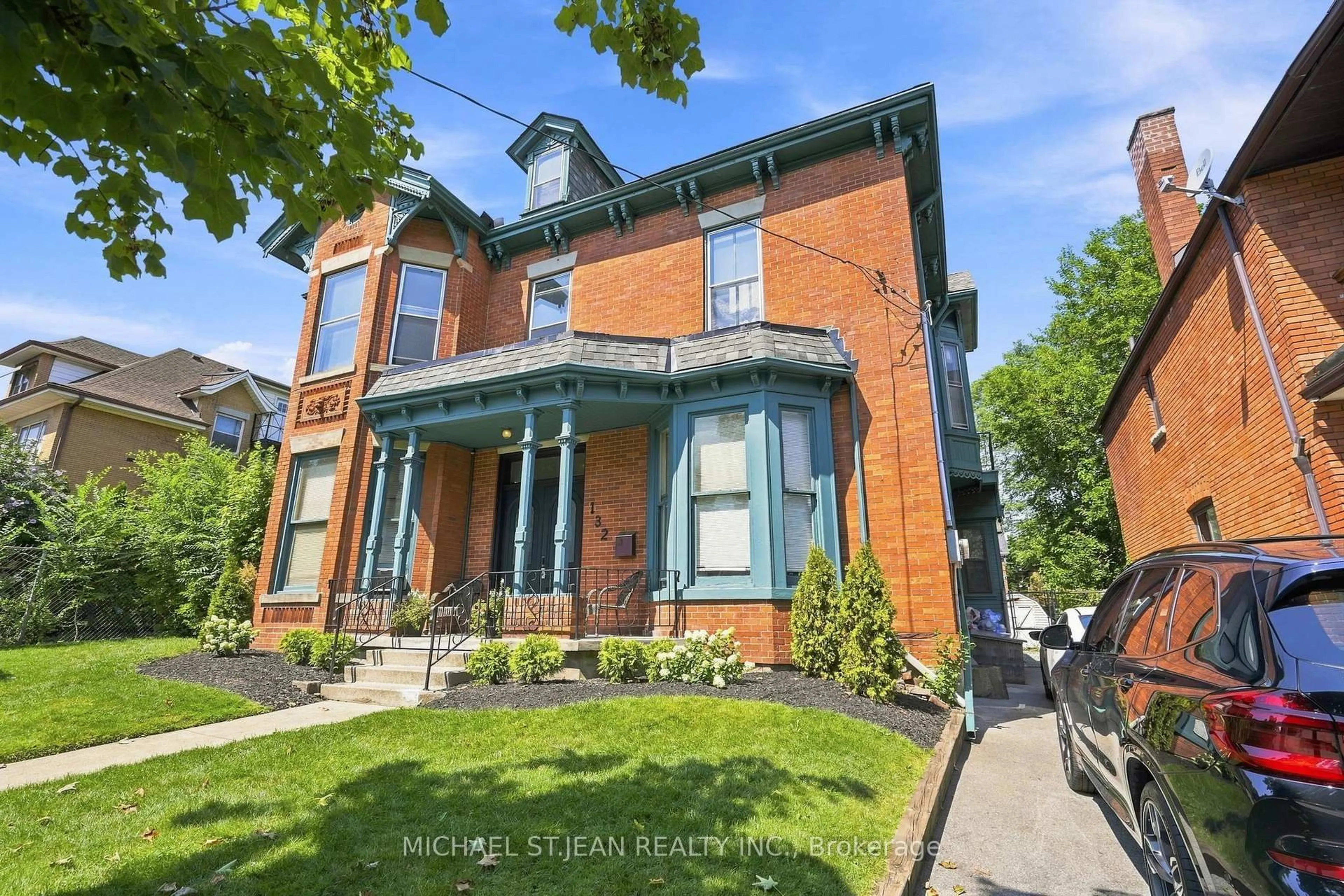 Home with brick exterior material, street for 132 Emerald St, Hamilton Ontario L8N 2V5