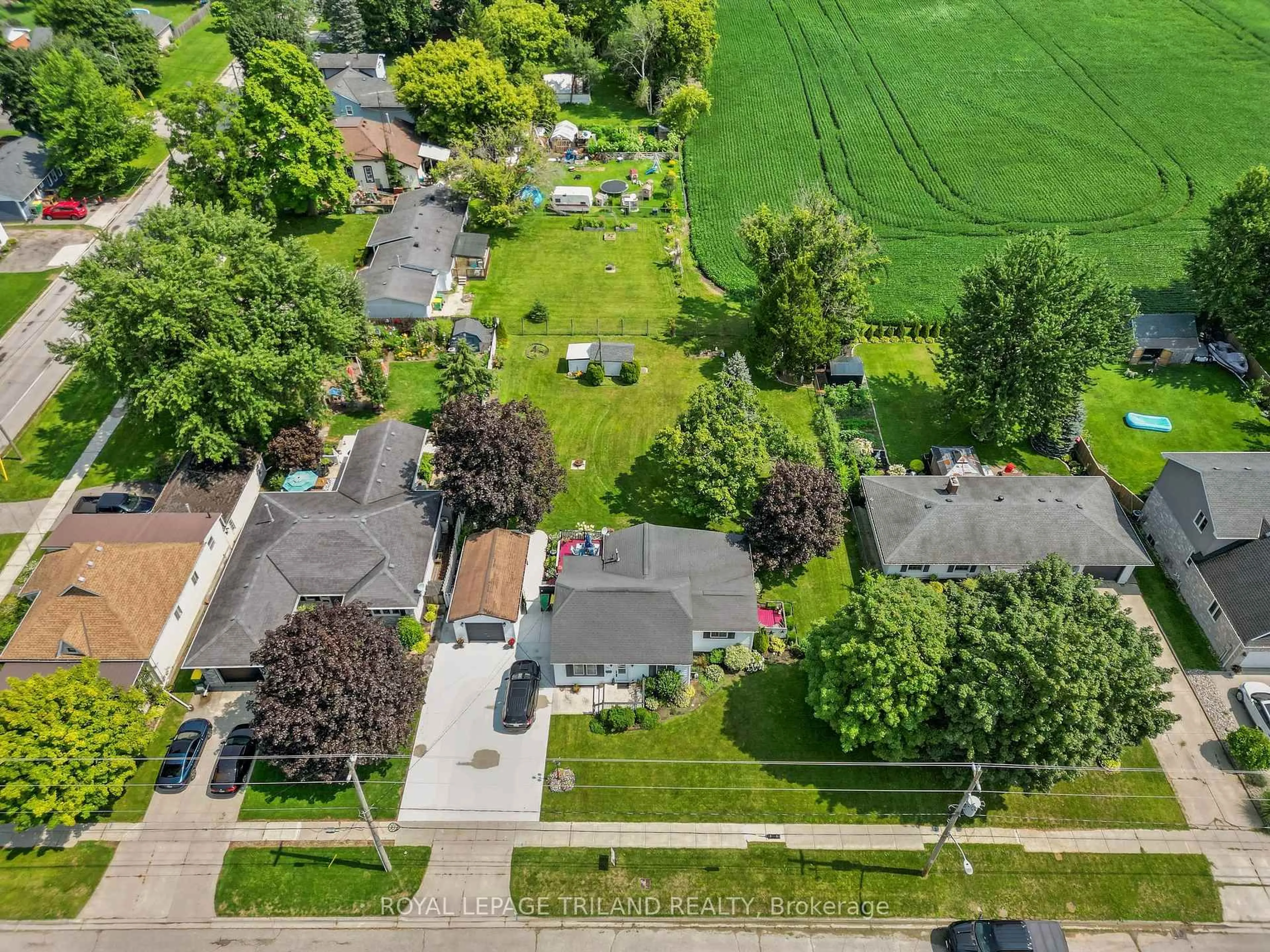 A pic from outside/outdoor area/front of a property/back of a property/a pic from drone, street for 165 Victoria St, Southwest Middlesex Ontario N0L 1M0