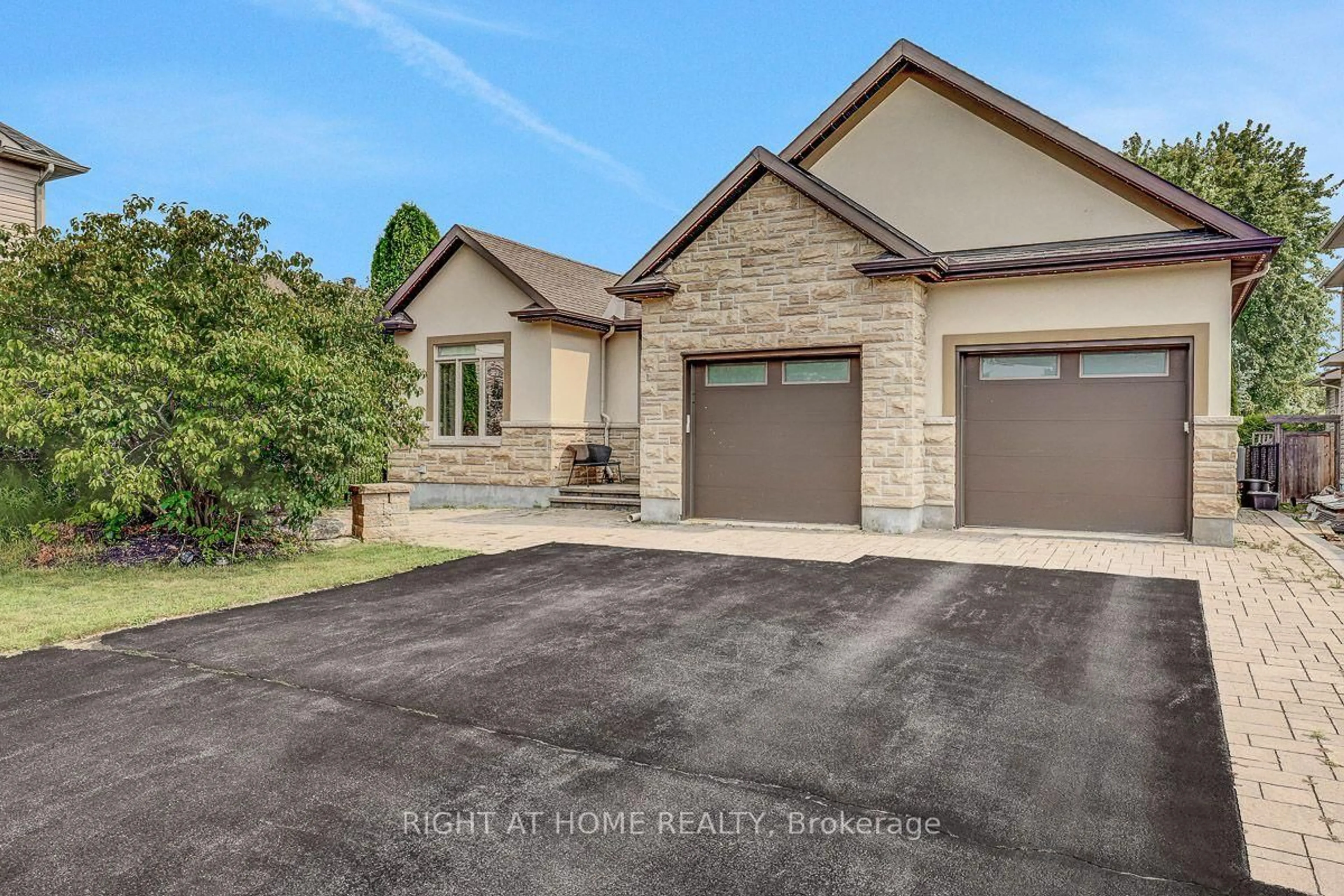 Home with brick exterior material, street for 514 Landswood Way, Ottawa Ontario K2S 0A5