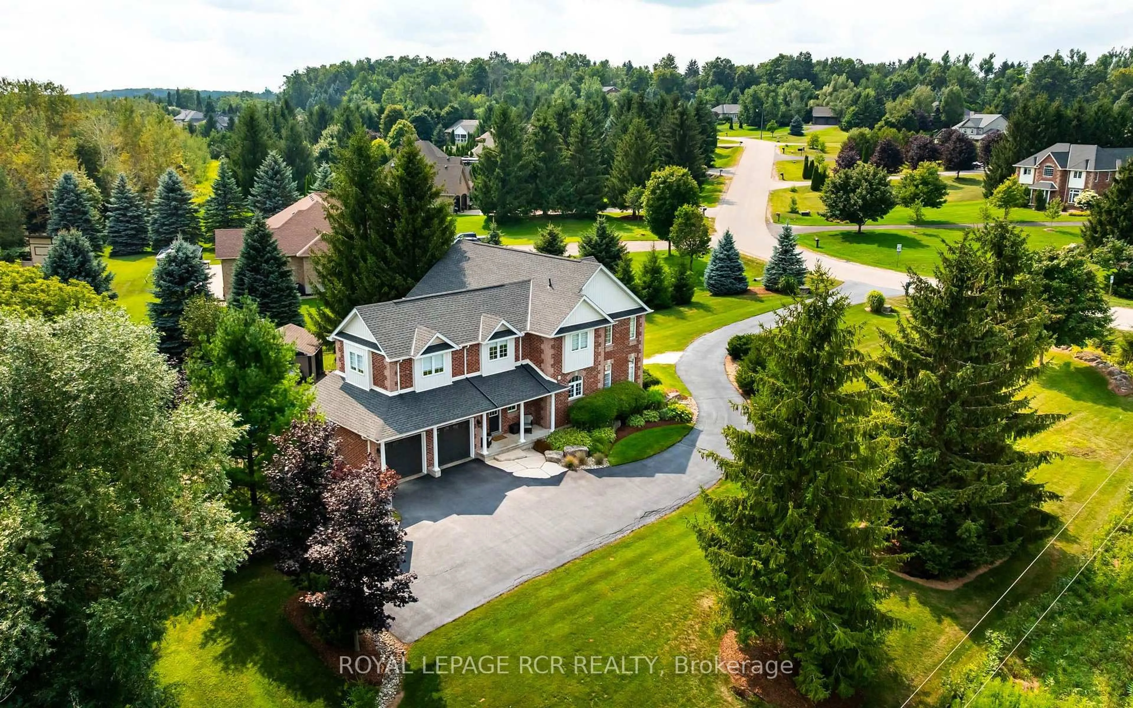 A pic from outside/outdoor area/front of a property/back of a property/a pic from drone, unknown for 44 Woodland Dr, East Garafraxa Ontario L9W 6B7
