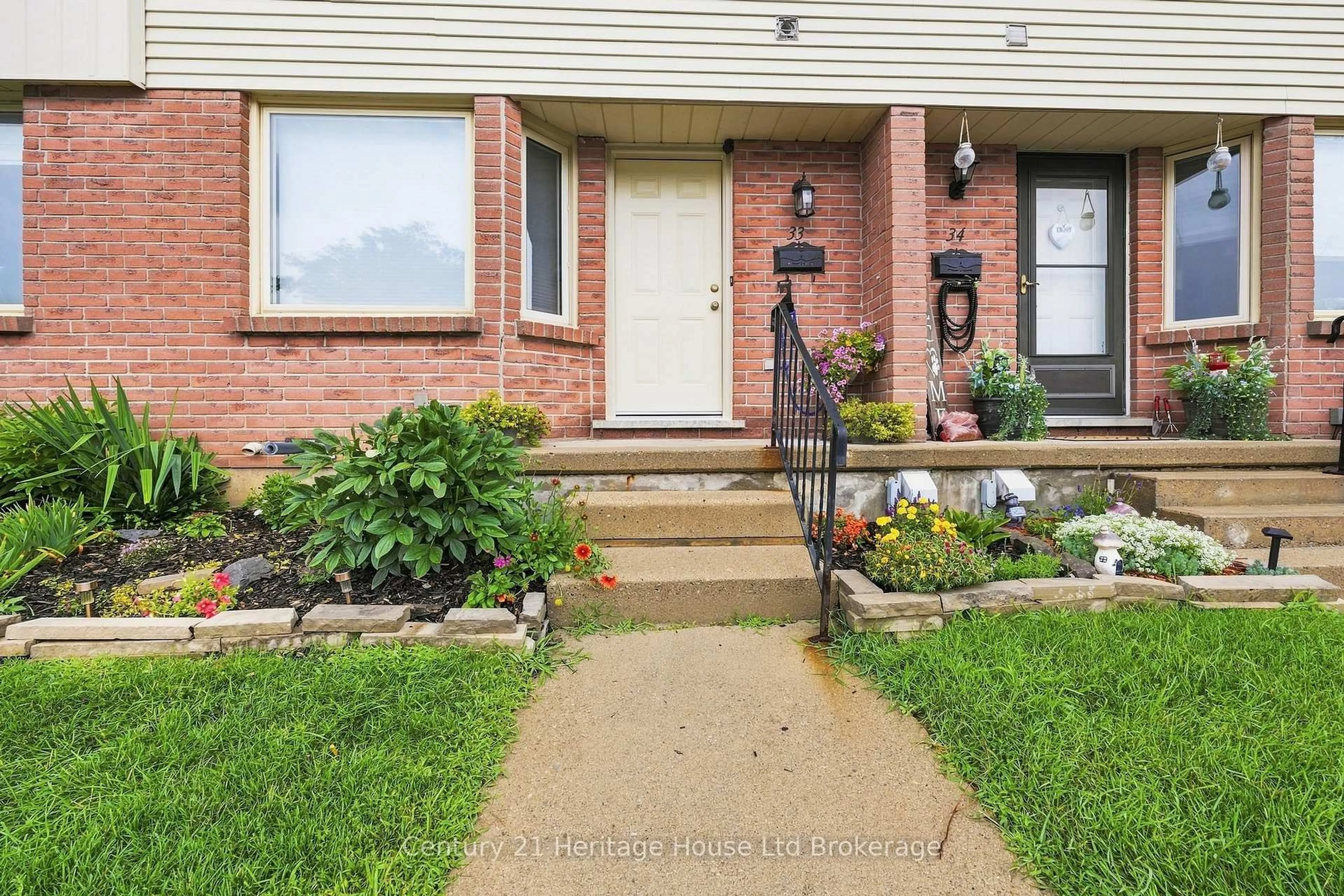 Home with brick exterior material, street for 1115 Nellis St #33, Woodstock Ontario N4T 1P6