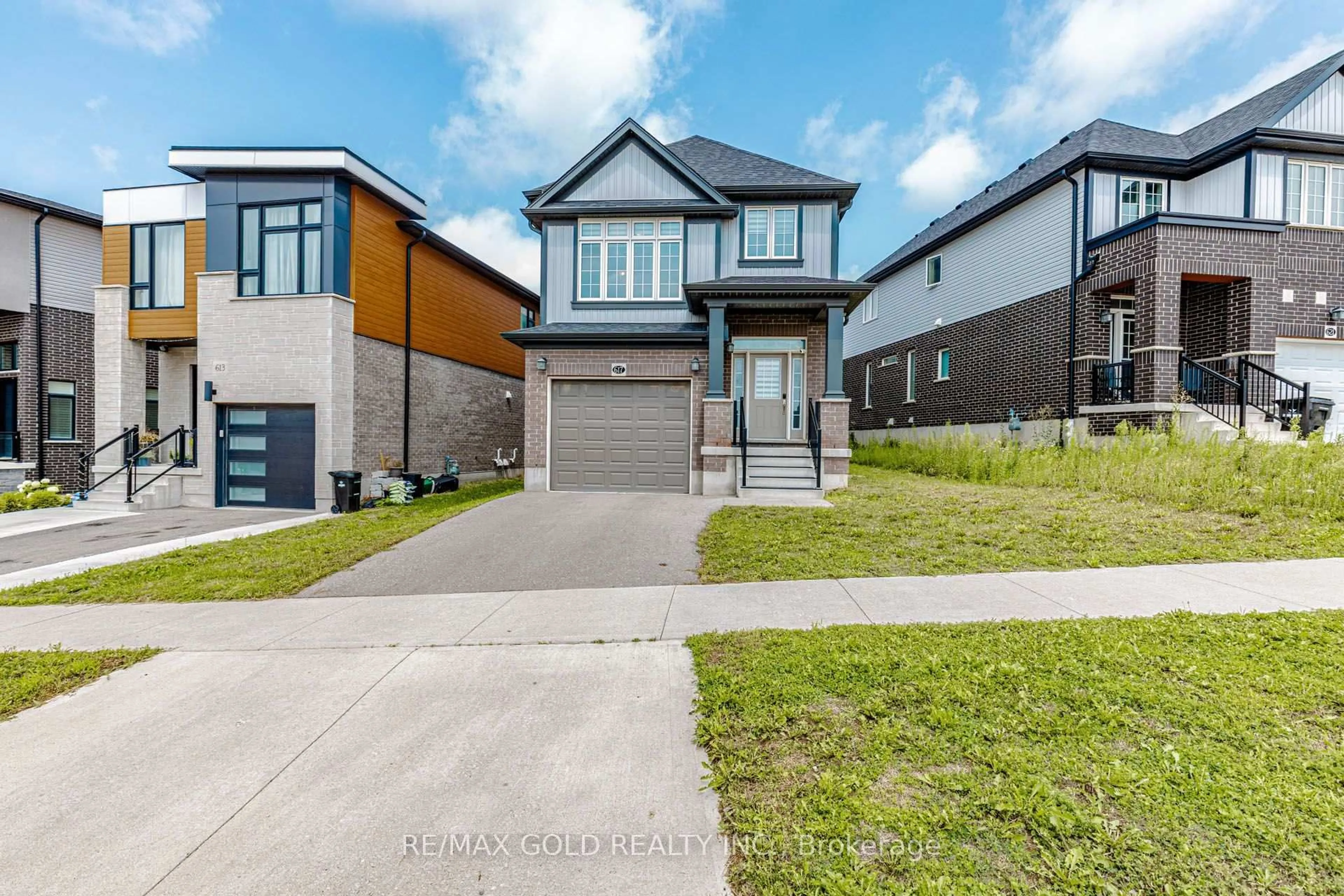 Home with brick exterior material, street for 617 Benninger Dr, Kitchener Ontario N2E 0H8