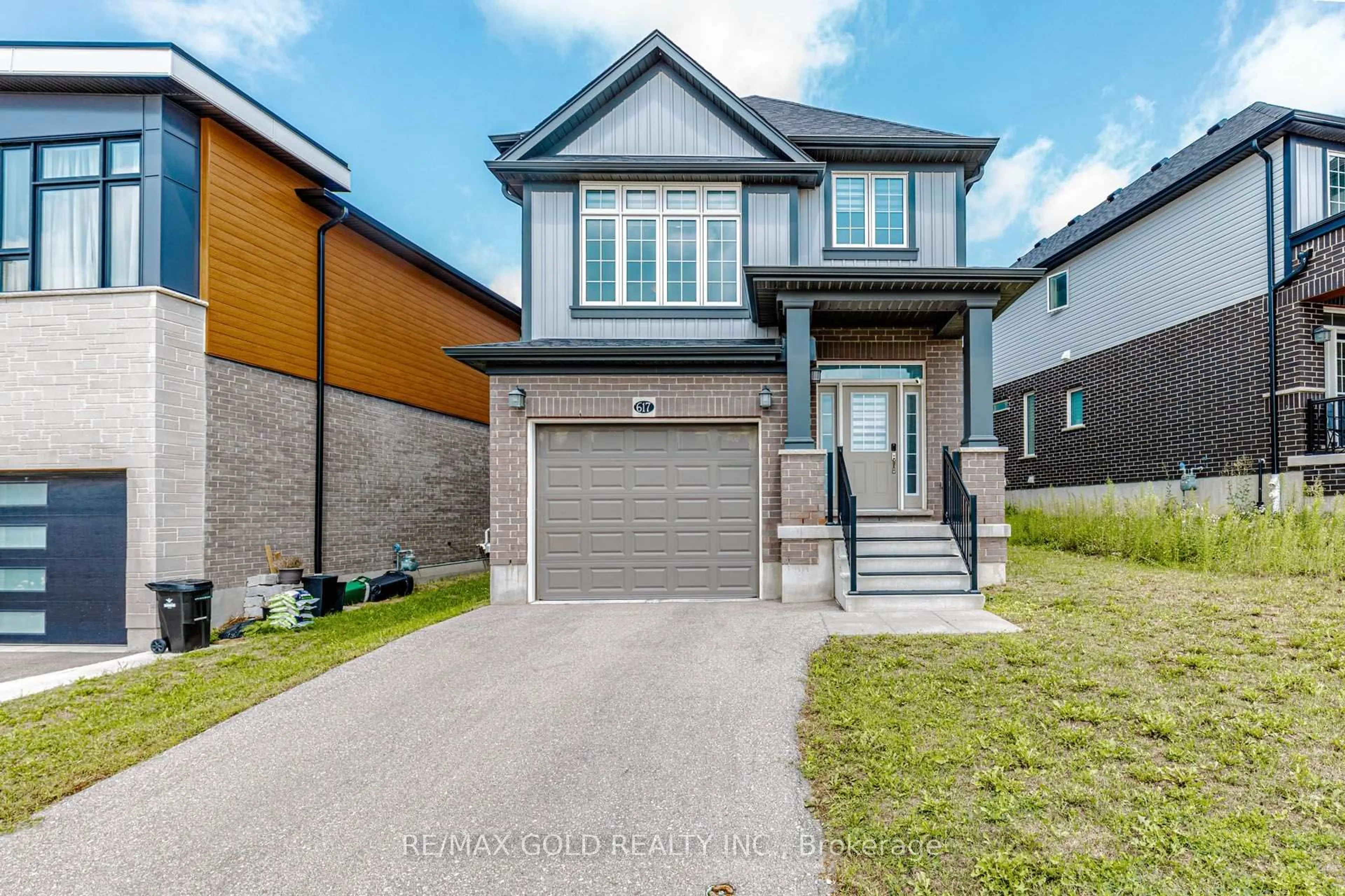 Home with brick exterior material, street for 617 Benninger Dr, Kitchener Ontario N2E 0H8