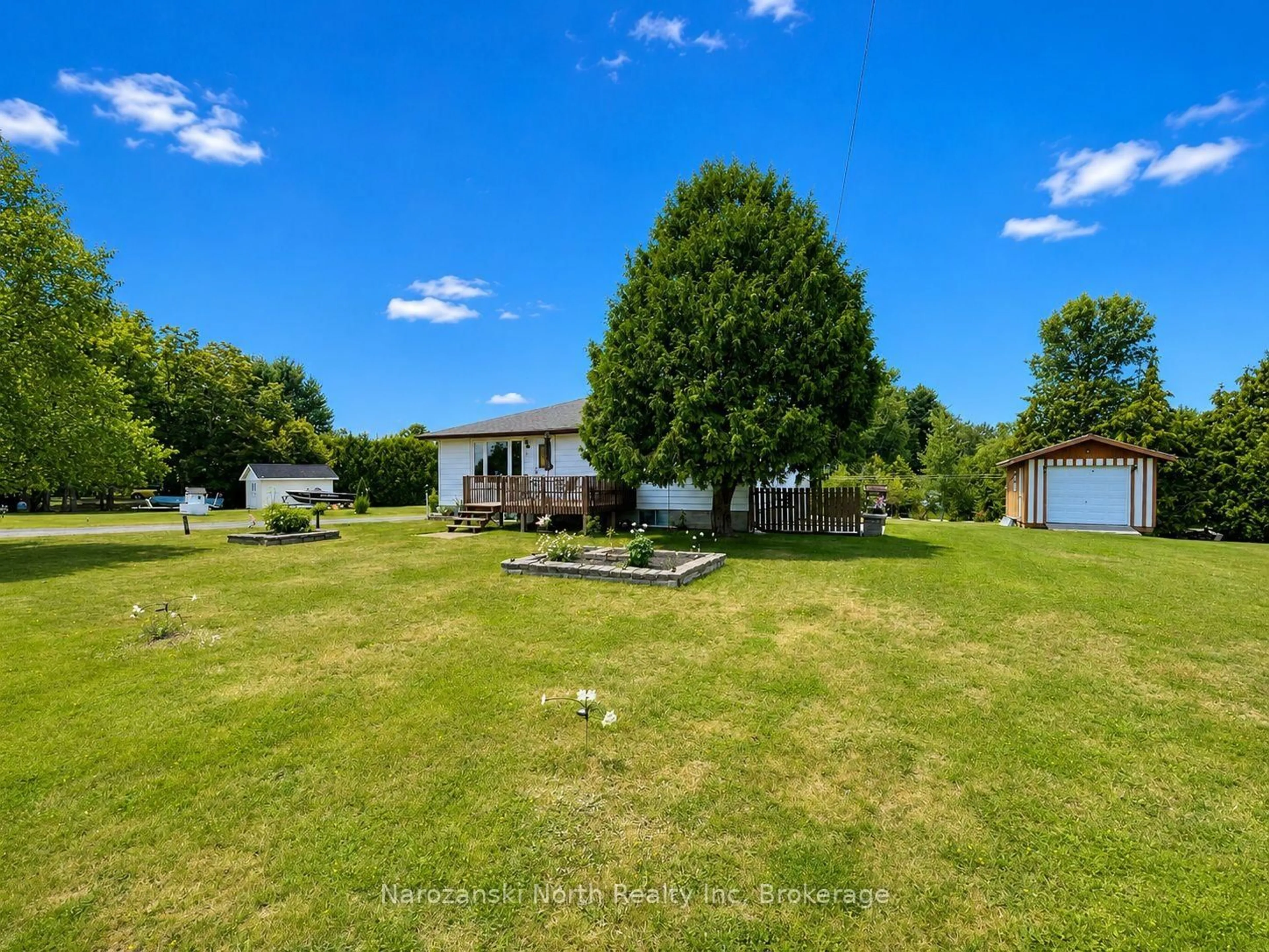 A pic from outside/outdoor area/front of a property/back of a property/a pic from drone, water/lake/river/ocean view for 1443 Hwy 64 Highway, French River Ontario P0M 1A0