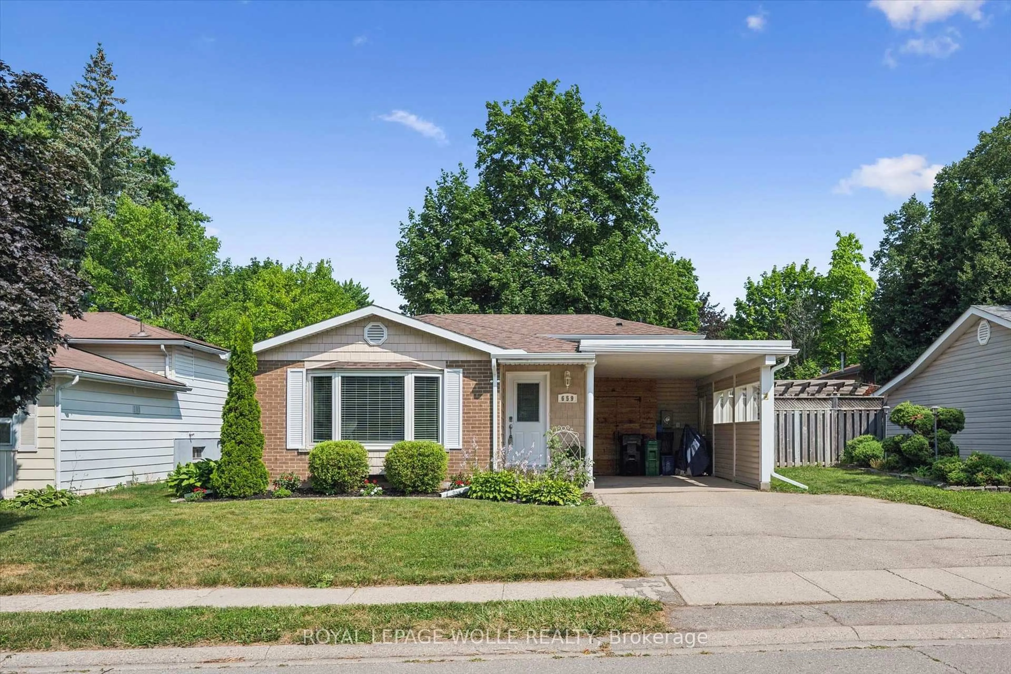 Home with vinyl exterior material, street for 659 Glen Forrest Blvd, Waterloo Ontario N2L 4K4