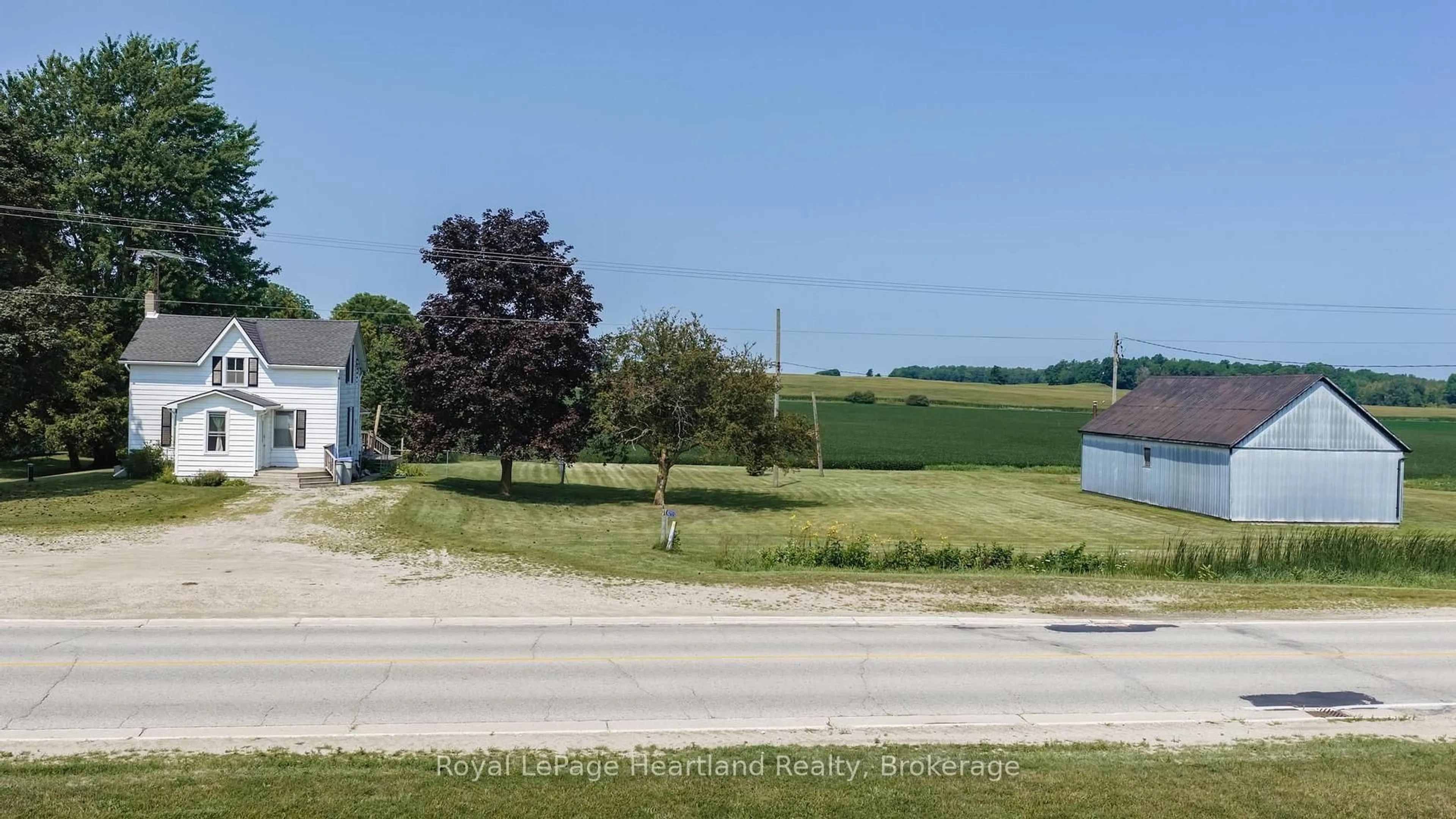 A pic from outside/outdoor area/front of a property/back of a property/a pic from drone, water/lake/river/ocean view for 82155 London Rd, Central Huron Ontario N0M 2H0
