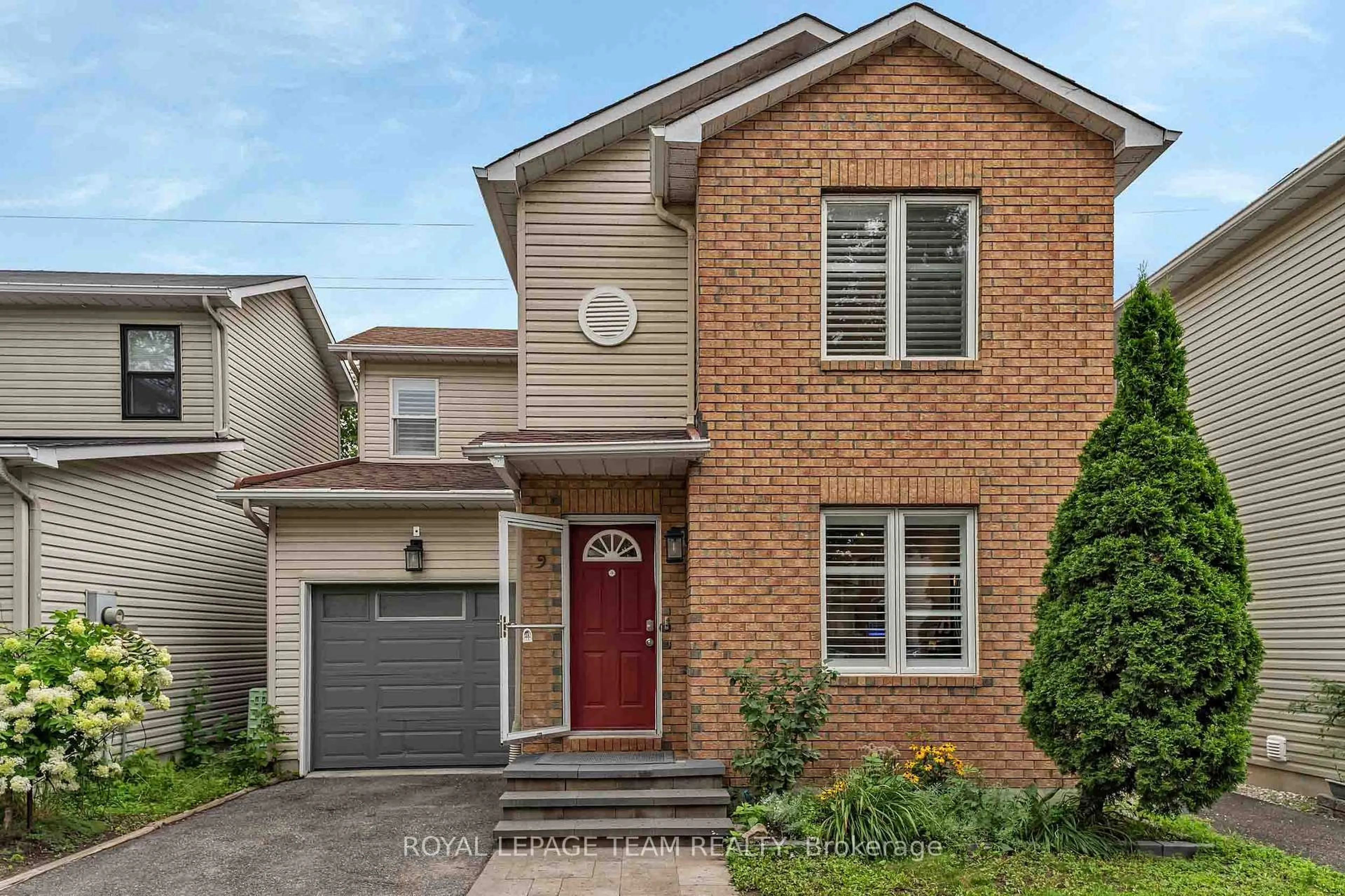 Home with brick exterior material, street for 583 Tweedsmuir Ave #9, Ottawa Ontario K1Z 5P4