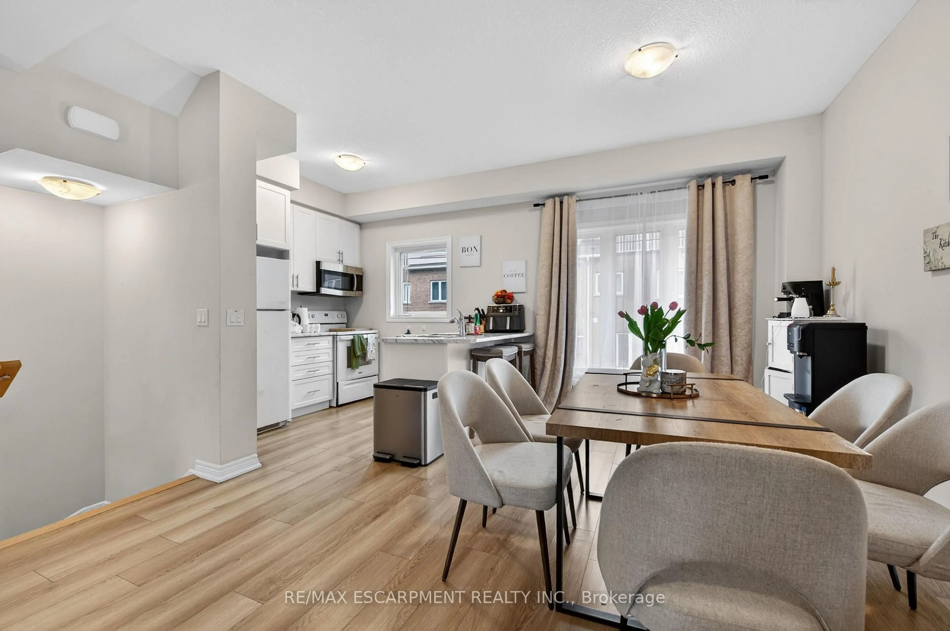 Open concept kitchen, wood/laminate floor for 19 Picardy Dr #13, Hamilton Ontario L8J 0M7