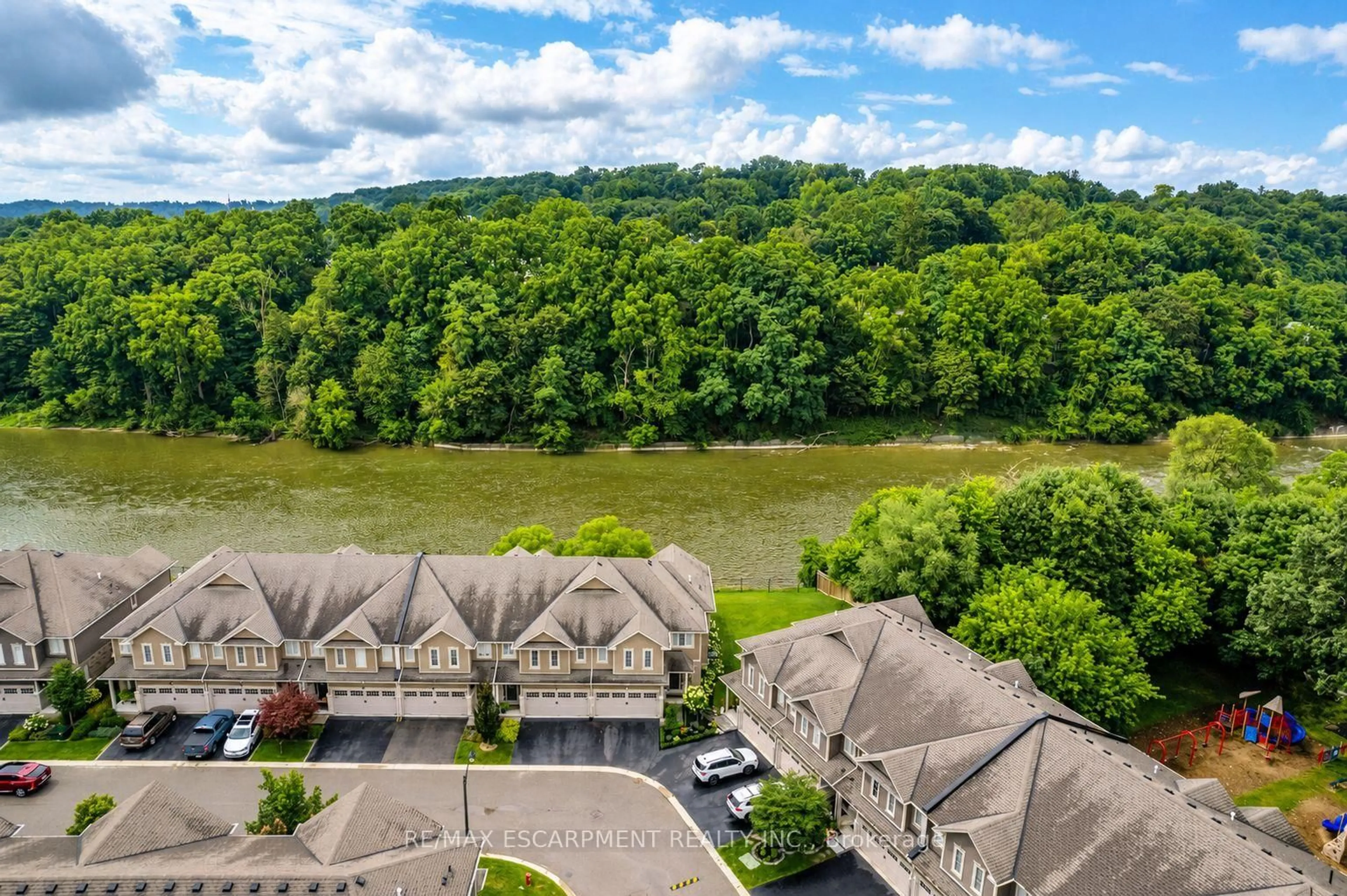 A pic from outside/outdoor area/front of a property/back of a property/a pic from drone, water/lake/river/ocean view for 80 Willow St #21, Brant Ontario N3L 2K6