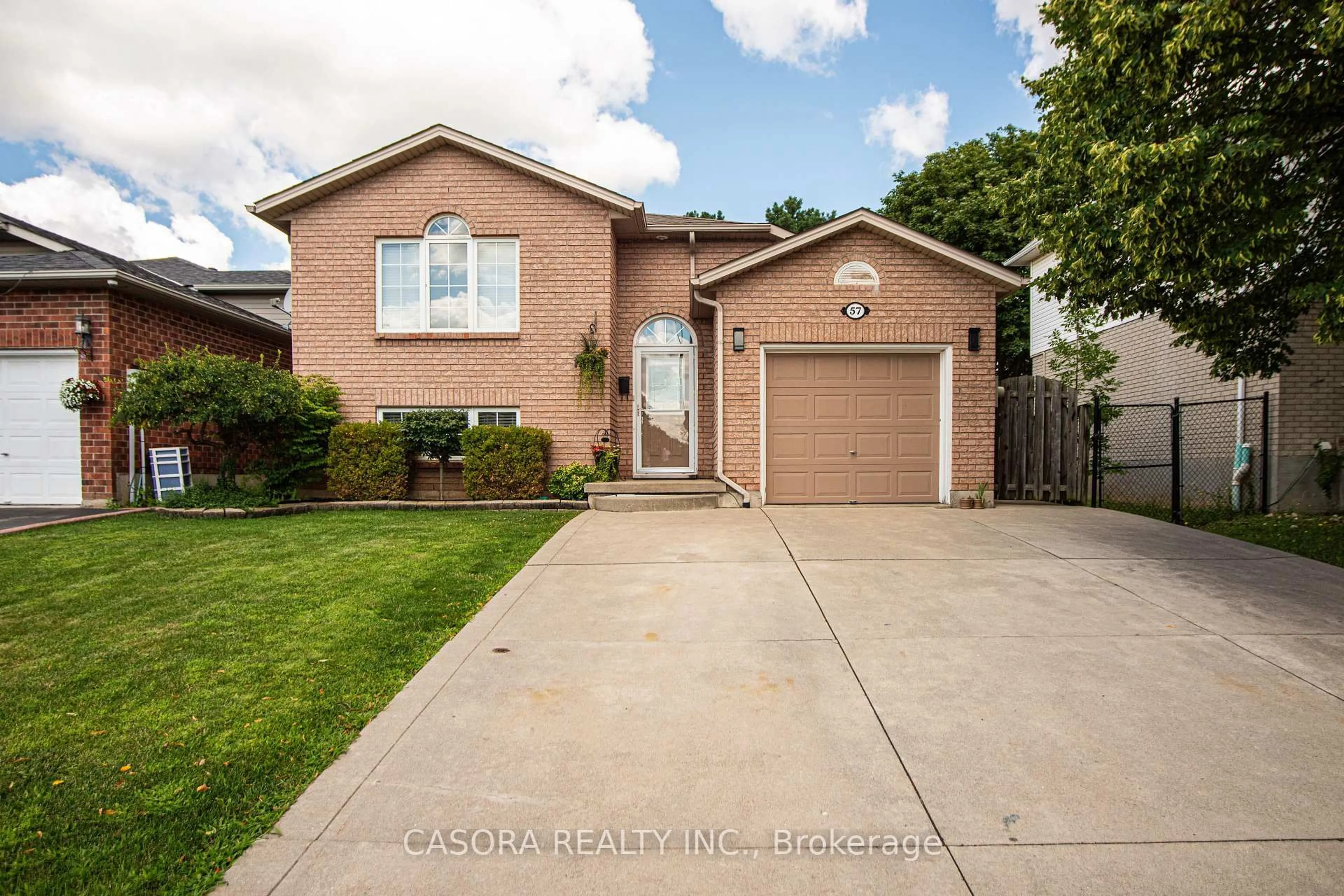 Home with brick exterior material, street for 57 Ossington Dr, Hamilton Ontario L8W 3S4