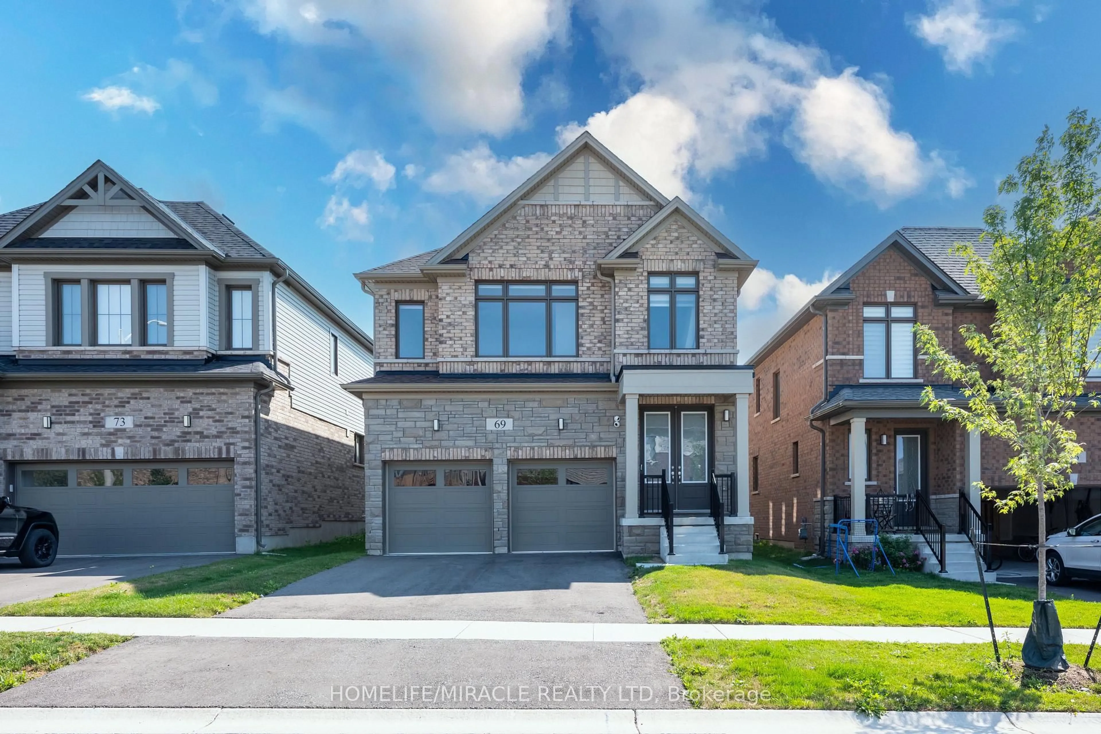 Home with brick exterior material, street for 69 Mary Watson St, North Dumfries Ontario N0B 1E0