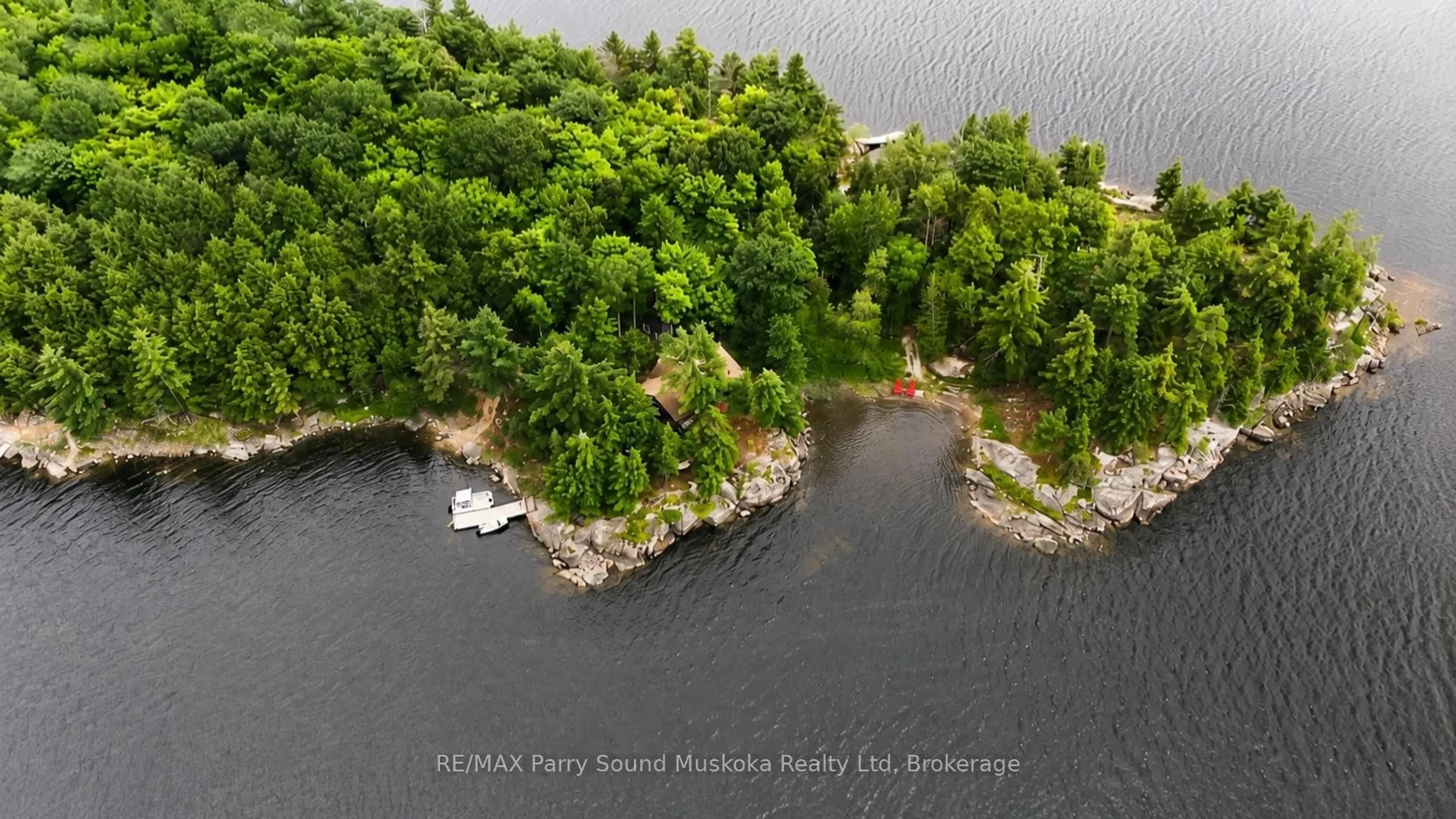 A pic from outside/outdoor area/front of a property/back of a property/a pic from drone, water/lake/river/ocean view for 24 Arbor Vitae Island, Whitestone Ontario P0A 1G0