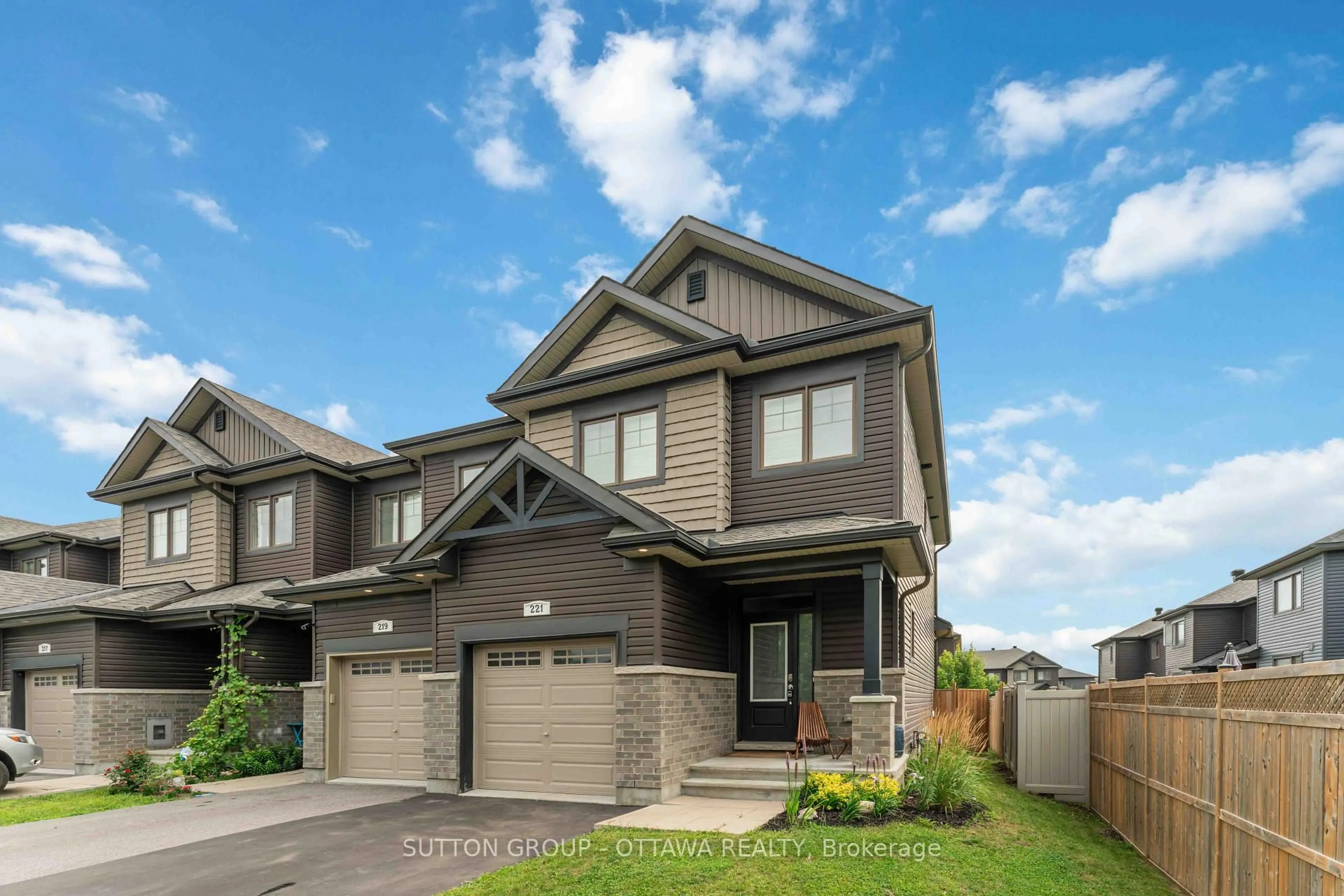Home with brick exterior material, street for 221 Tim Sheehan Pl, Ottawa Ontario K2V 0N1