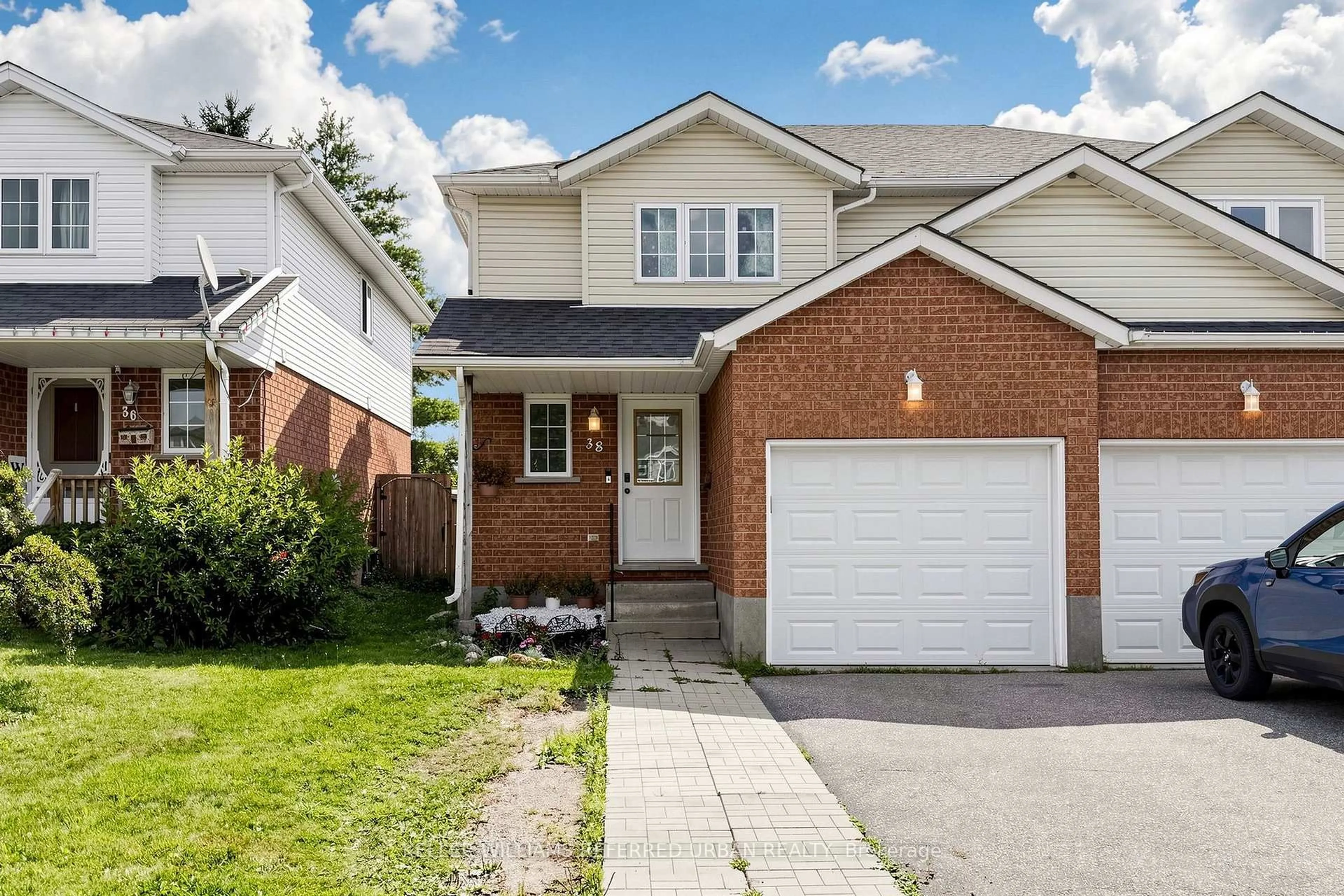 Home with brick exterior material, street for 38 Activa Ave, Kitchener Ontario N2E 3R2