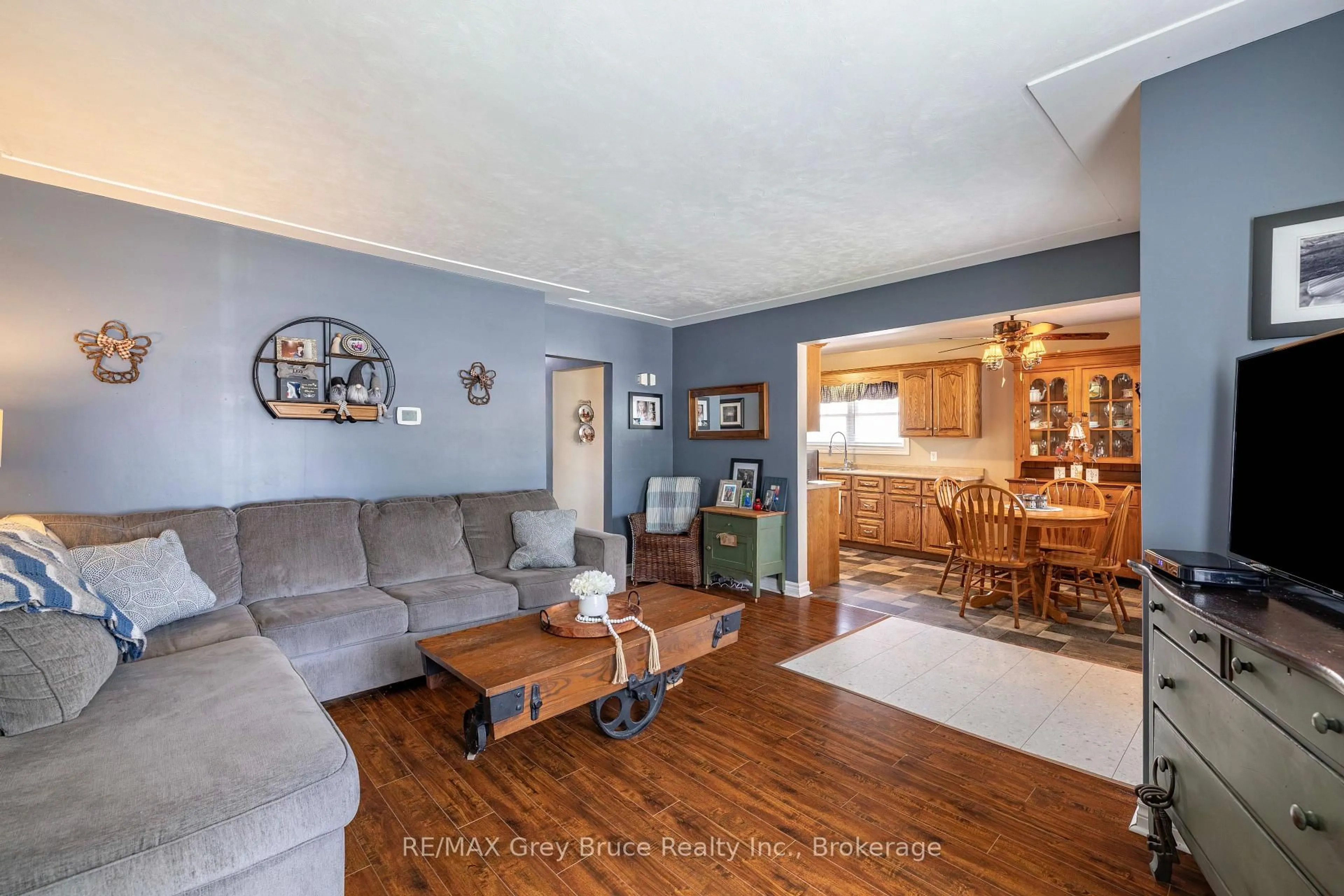 Living room with furniture, wood/laminate floor for 175 Fergus St, Wellington North Ontario N0G 2L0