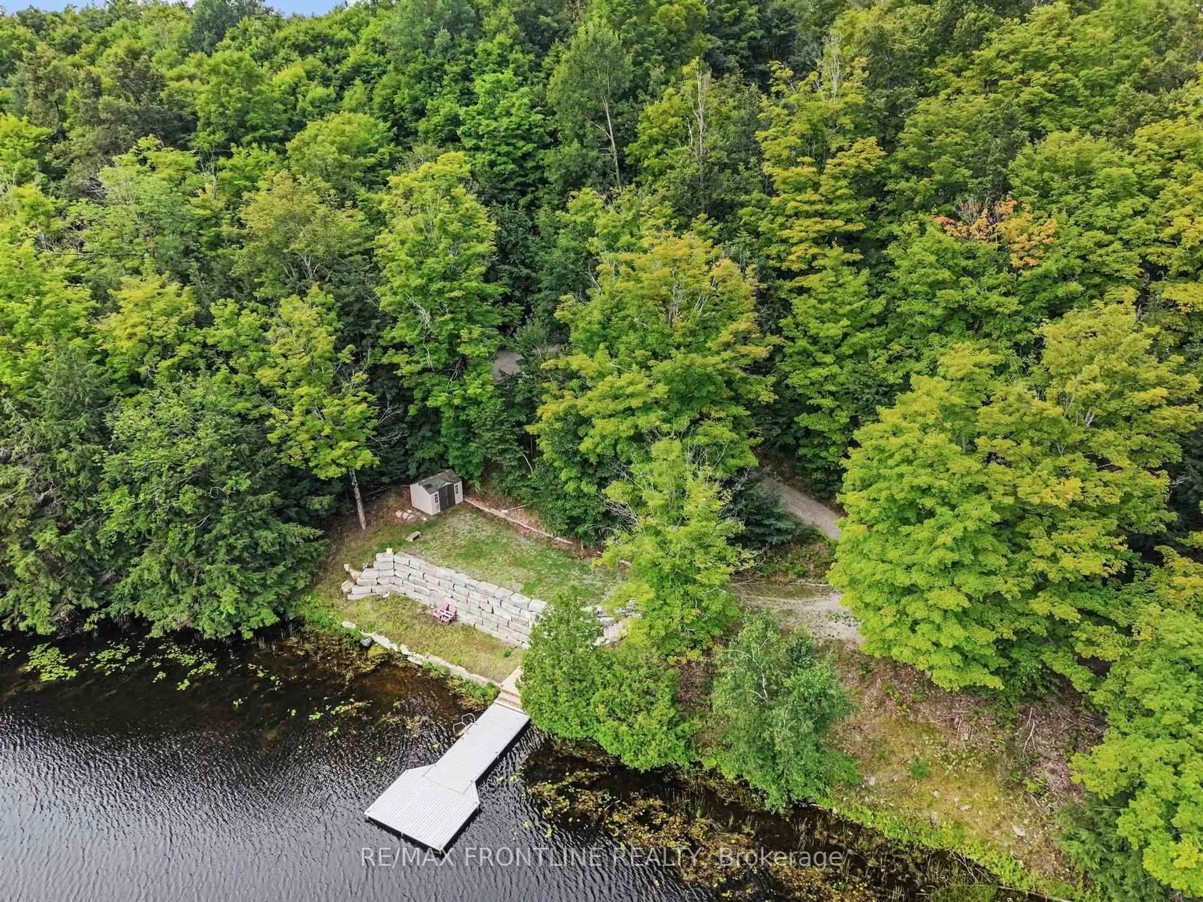 A pic from outside/outdoor area/front of a property/back of a property/a pic from drone, water/lake/river/ocean view for 178 Burke Lane, Maberly Ontario K0H 2B0