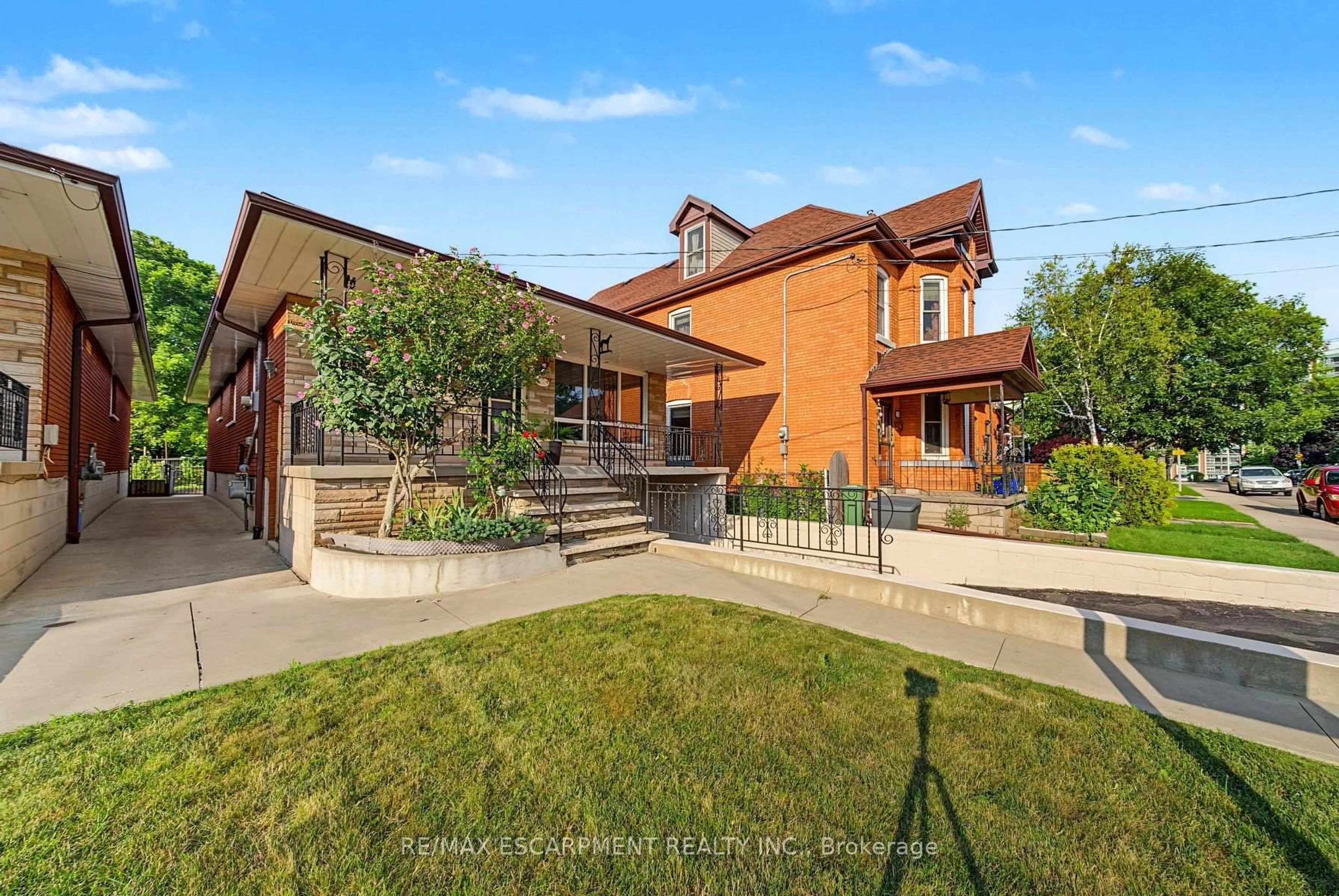 Home with brick exterior material, street for 44 Tom St, Hamilton Ontario L8R 1X4