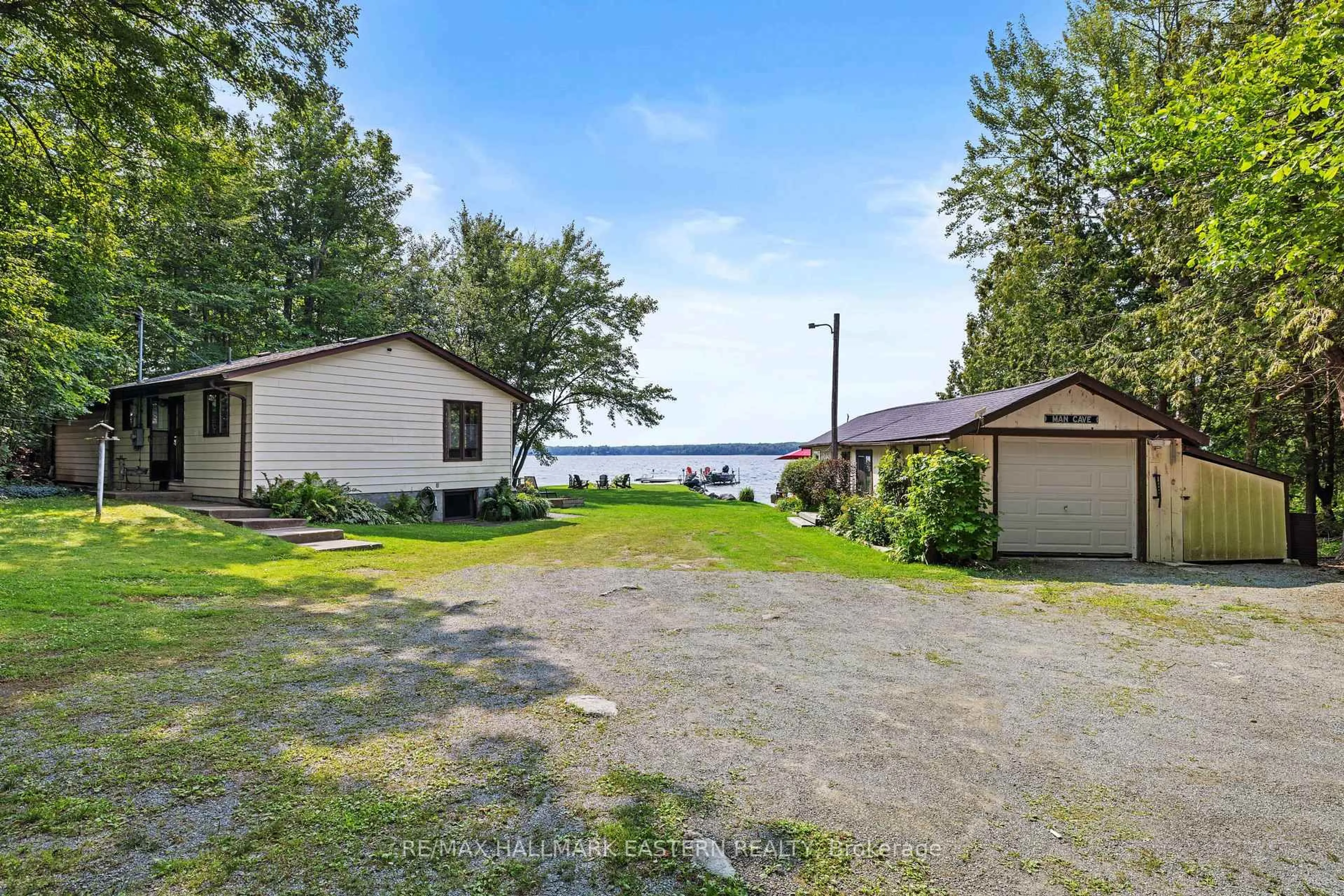 A pic from outside/outdoor area/front of a property/back of a property/a pic from drone, water/lake/river/ocean view for 2546 Buckhorn Rd, Selwyn Ontario K0L 2H0