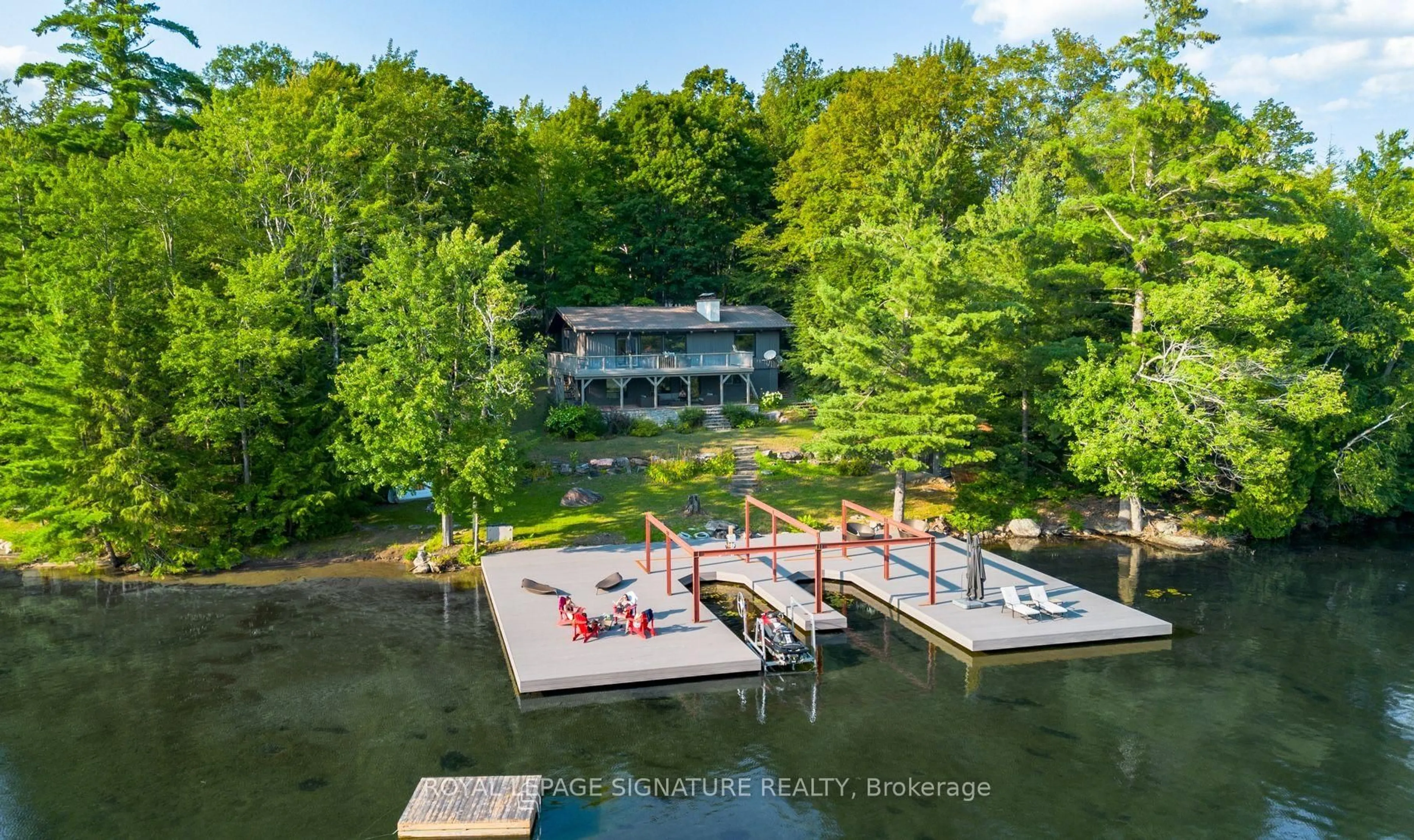 A pic from outside/outdoor area/front of a property/back of a property/a pic from drone, water/lake/river/ocean view for 1216 Hamills Point Rd, Muskoka Lakes Ontario P0B 1J0