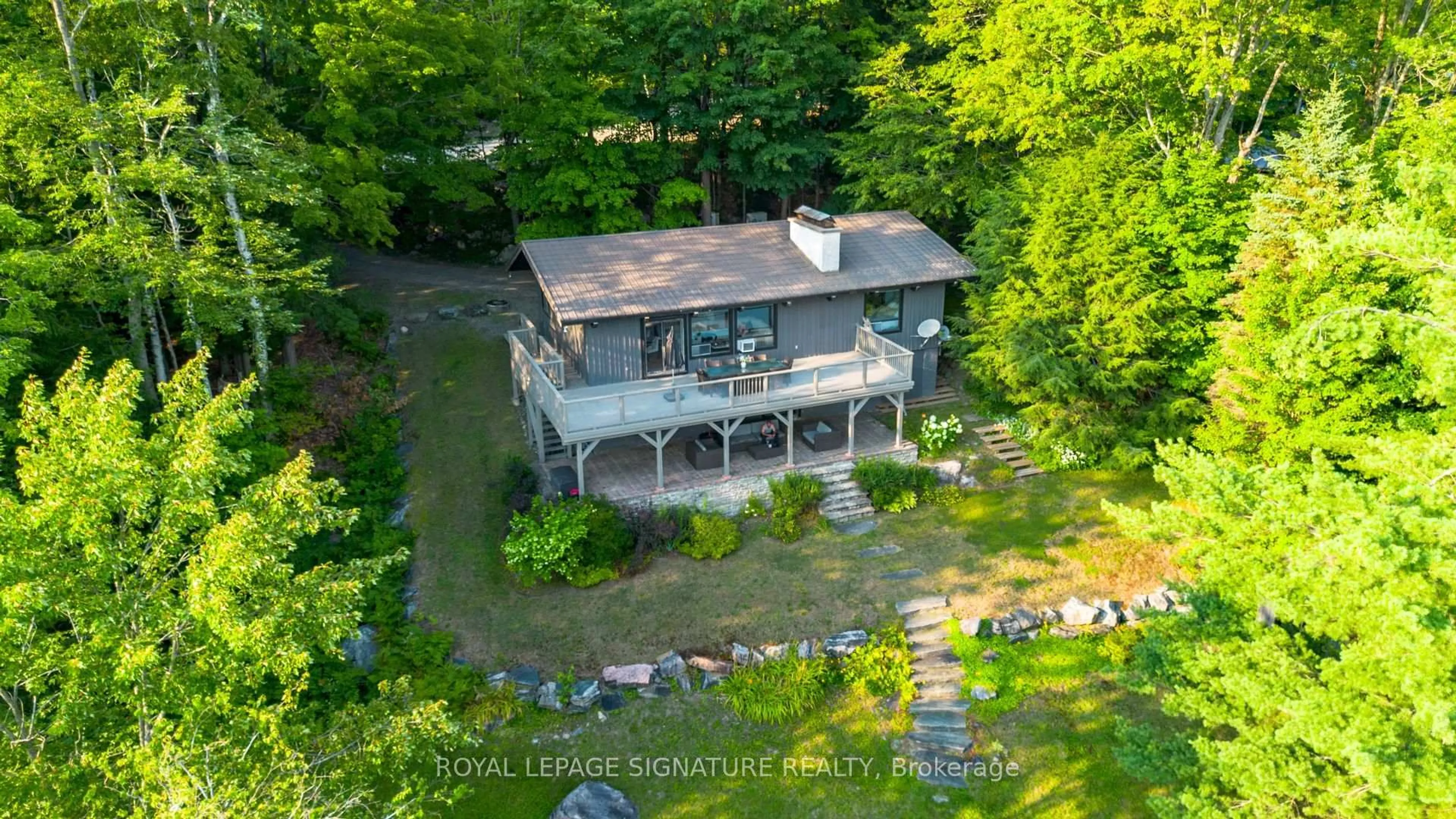 A pic from outside/outdoor area/front of a property/back of a property/a pic from drone, water/lake/river/ocean view for 1216 Hamills Point Rd, Muskoka Lakes Ontario P0B 1J0