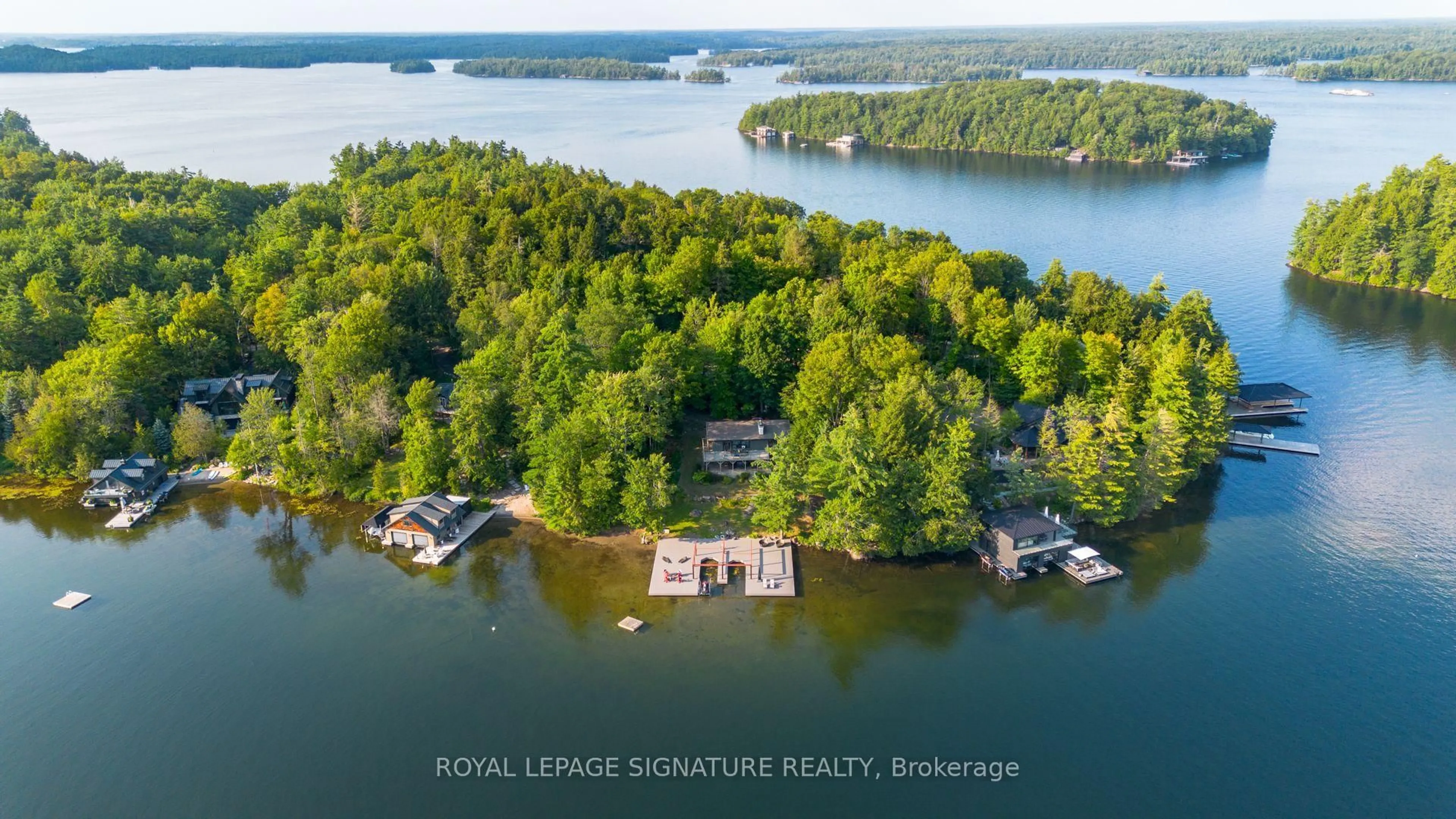 A pic from outside/outdoor area/front of a property/back of a property/a pic from drone, water/lake/river/ocean view for 1216 Hamills Point Rd, Muskoka Lakes Ontario P0B 1J0