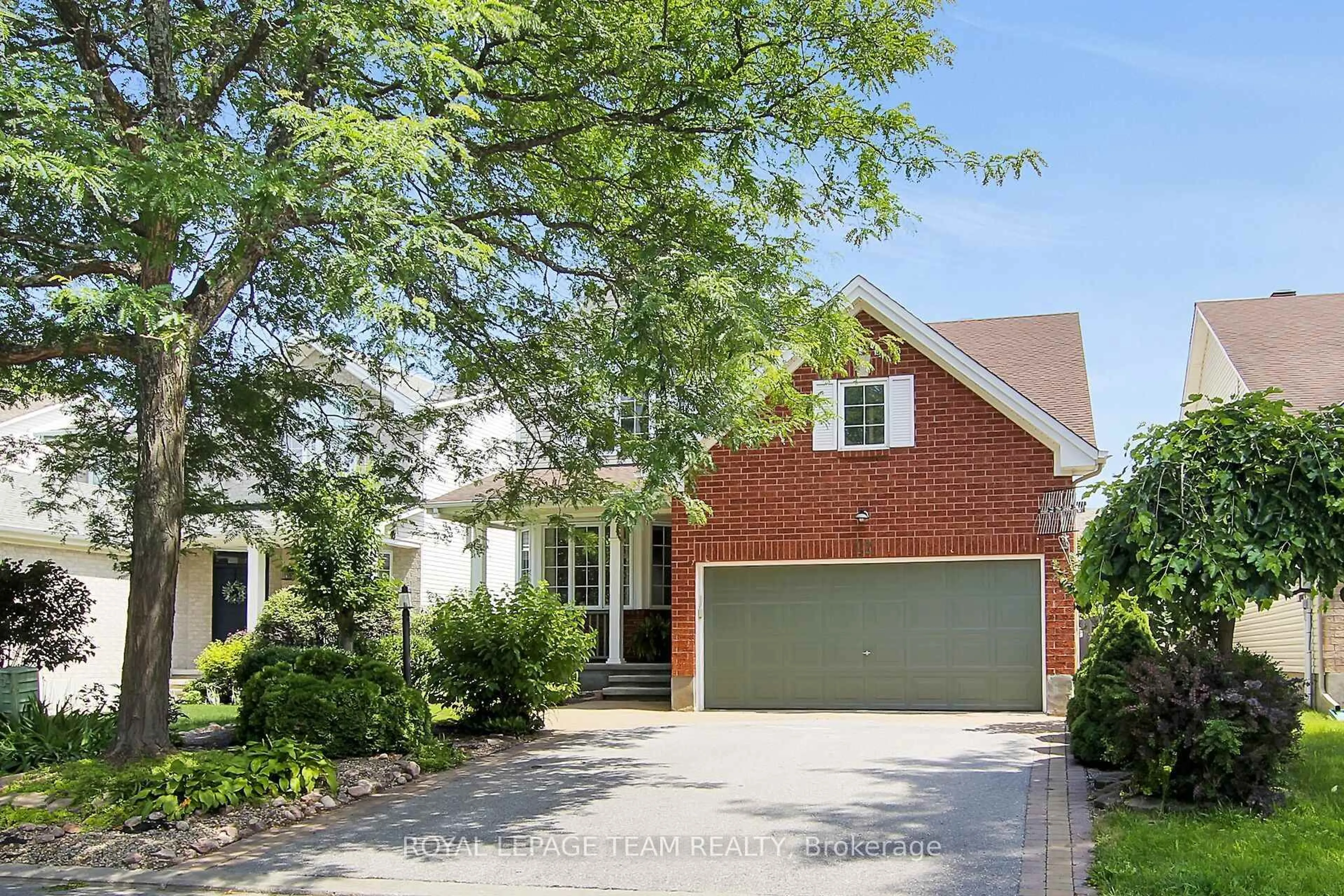 Home with brick exterior material, street for 12 Mattawa Cres, Ottawa Ontario K2M 2J4