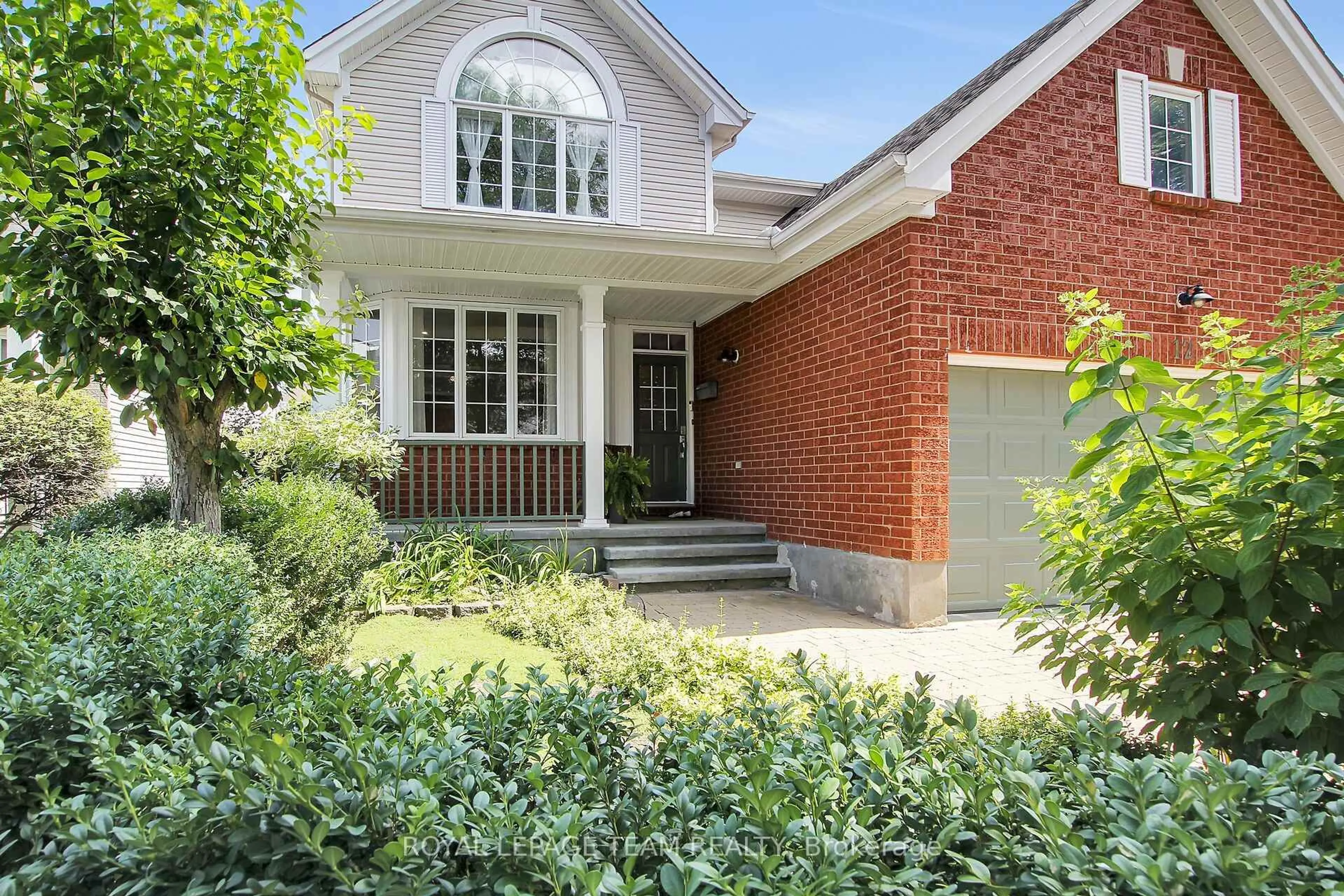 Home with brick exterior material, street for 12 Mattawa Cres, Ottawa Ontario K2M 2J4