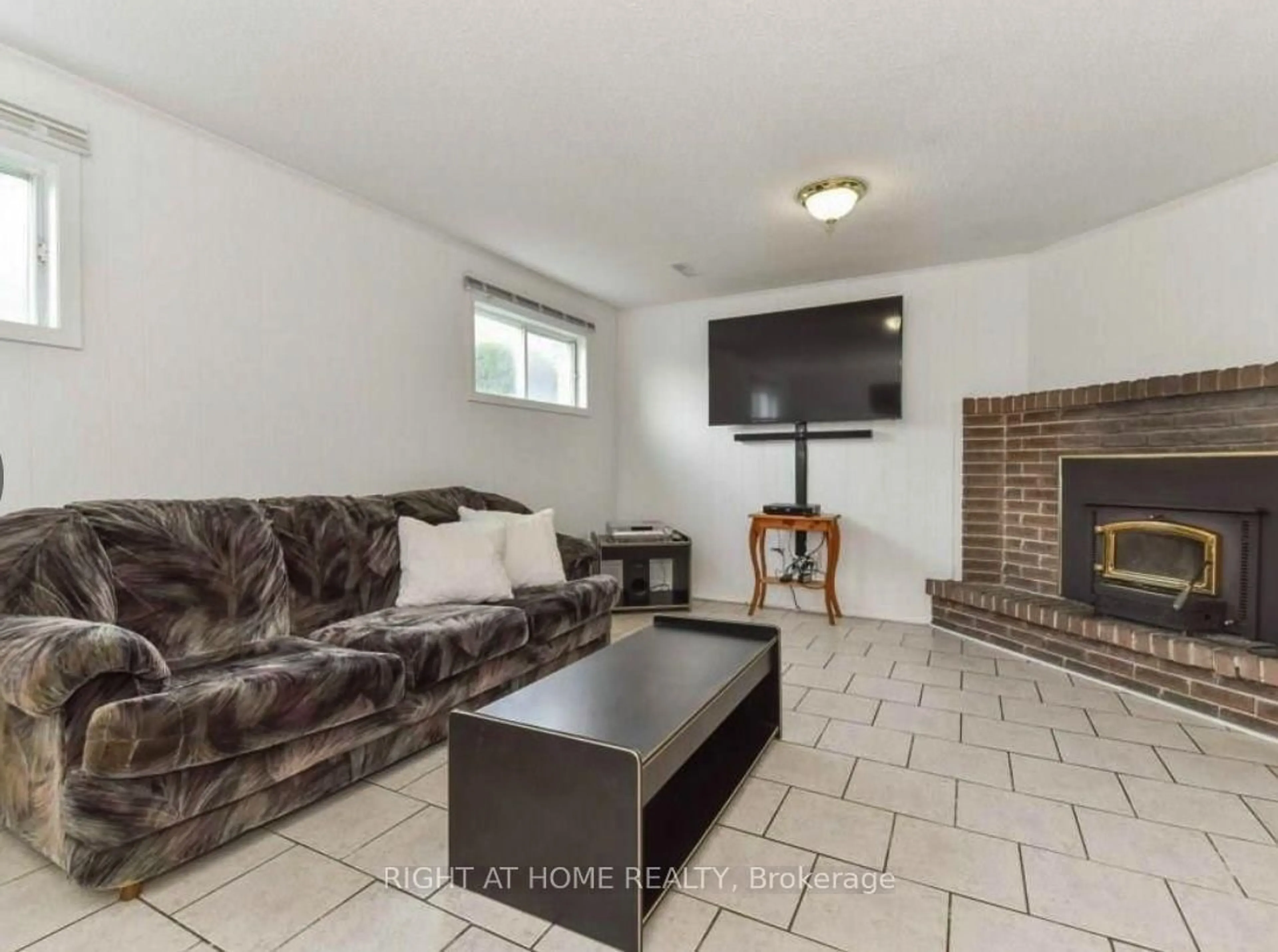 Living room with furniture, ceramic/tile floor for 113 Southwood Dr, Kitchener Ontario N2E 2J1