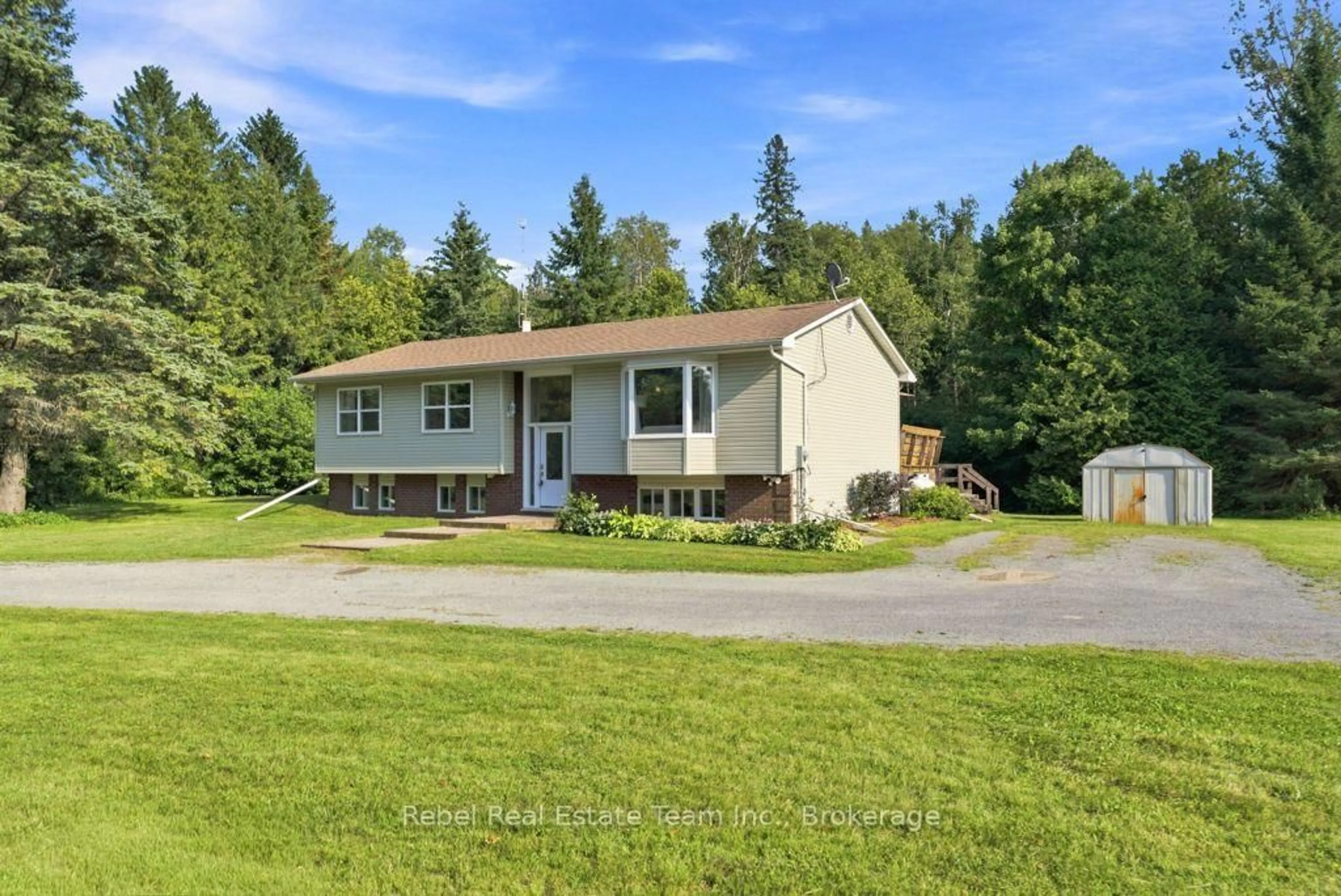 A pic from outside/outdoor area/front of a property/back of a property/a pic from drone, street for 5998 County Rd 65, Port Hope Ontario L1A 3V5