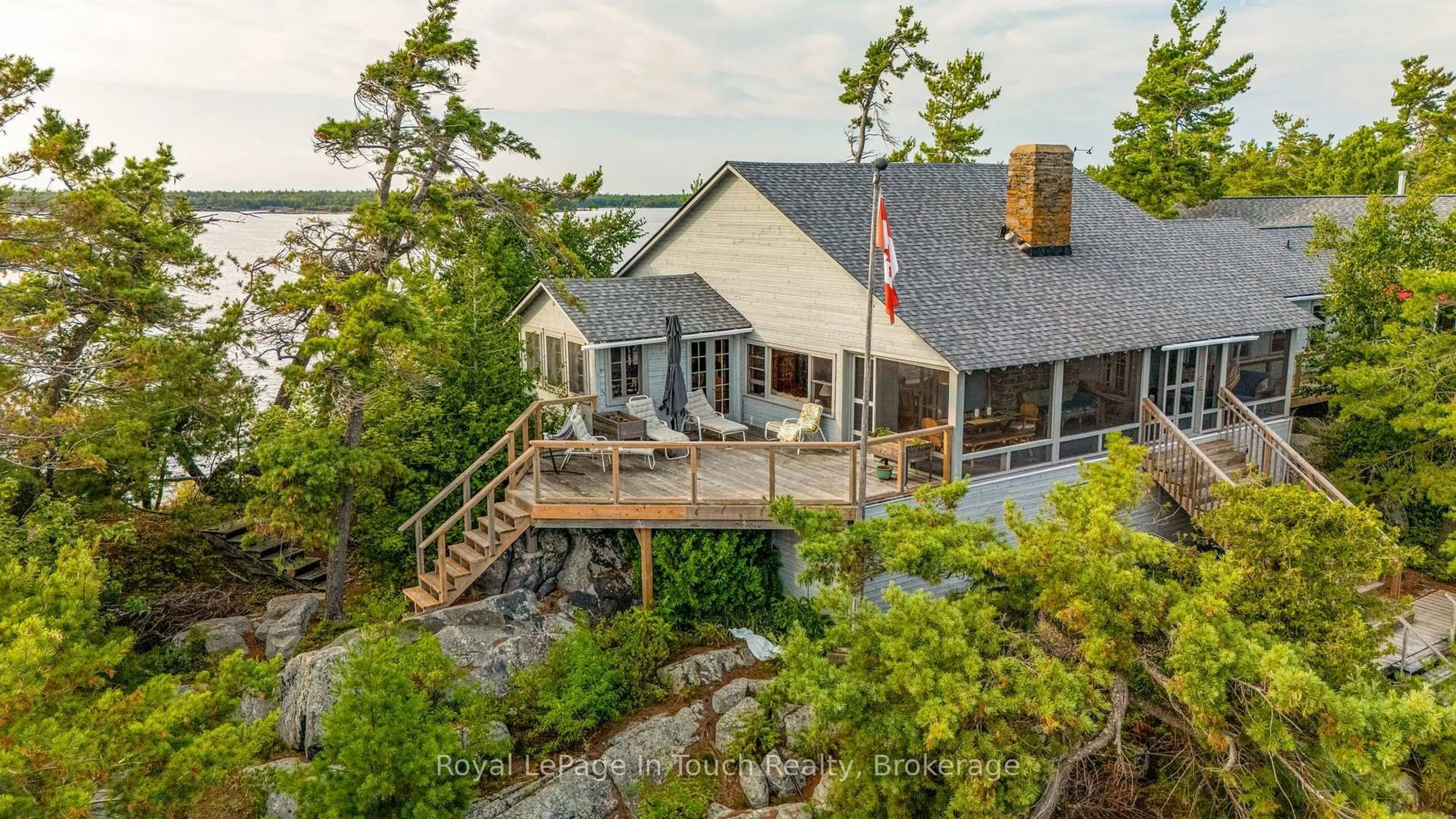 A pic from outside/outdoor area/front of a property/back of a property/a pic from drone, water/lake/river/ocean view for 1 B427 Turning Island, The Archipelago Ontario P2A 0B7