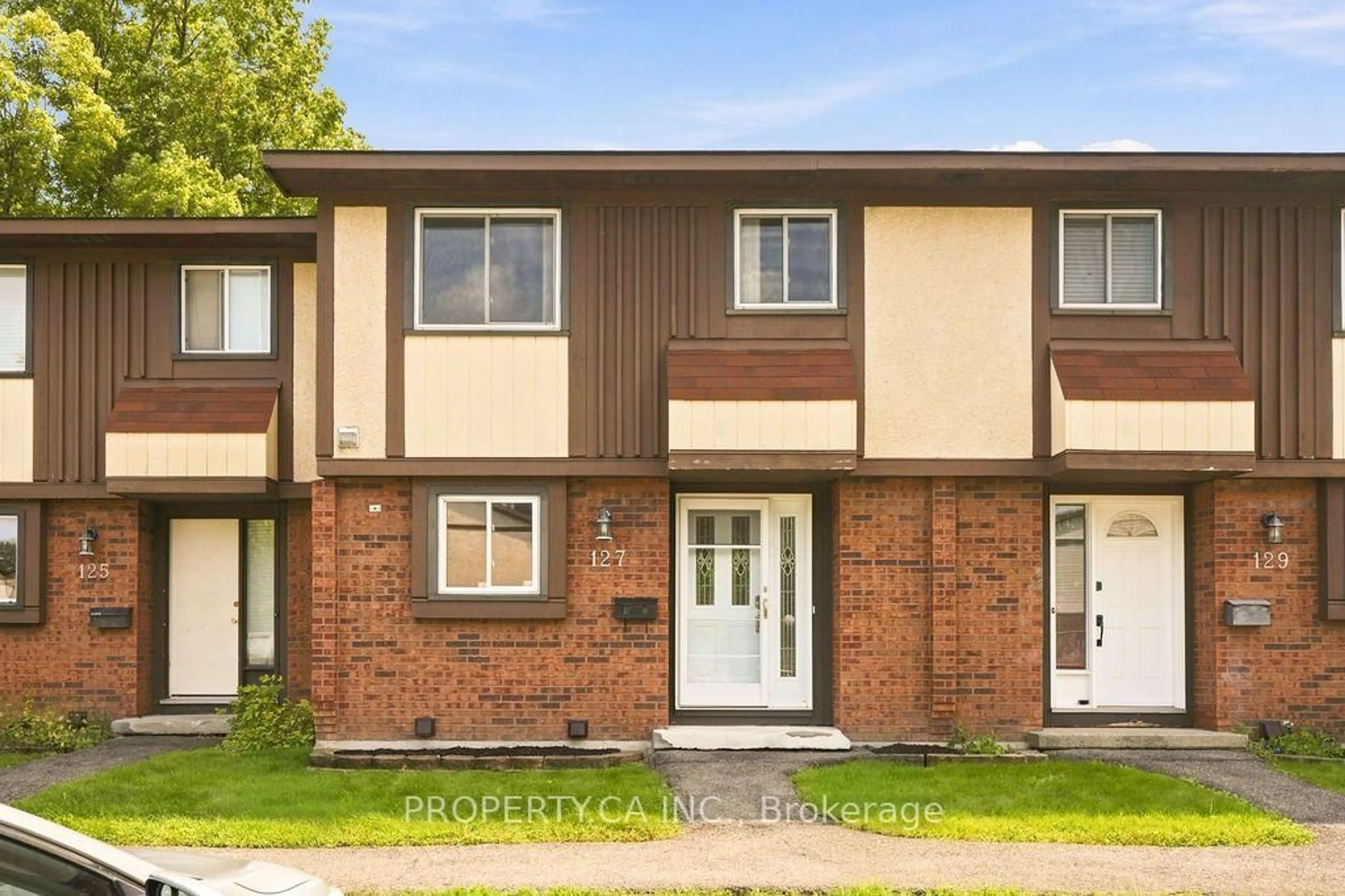 Home with brick exterior material, street for 127 Pickford Dr, Kanata Ontario K2L 2C3