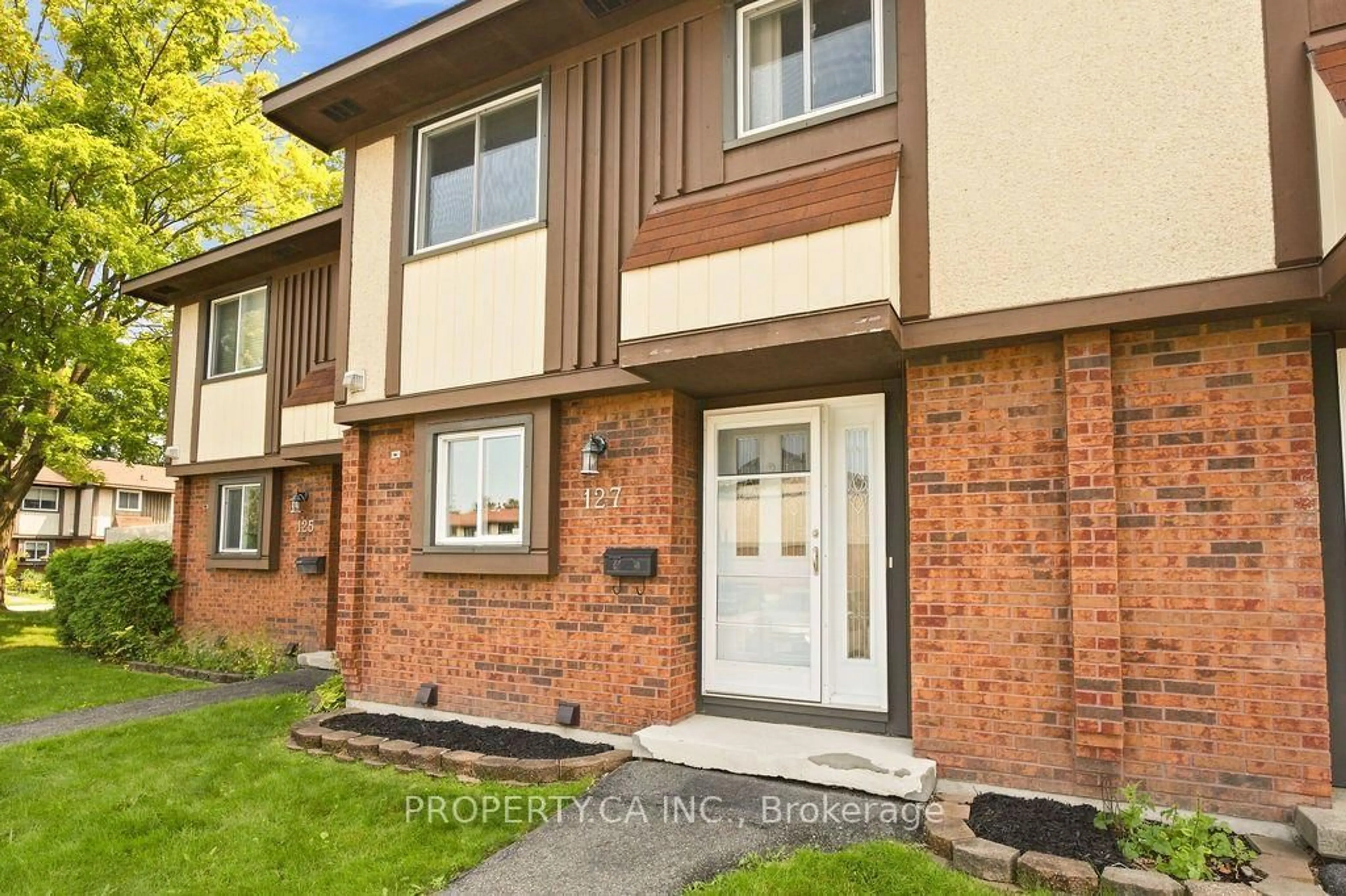 Home with brick exterior material, street for 127 Pickford Dr, Kanata Ontario K2L 2C3