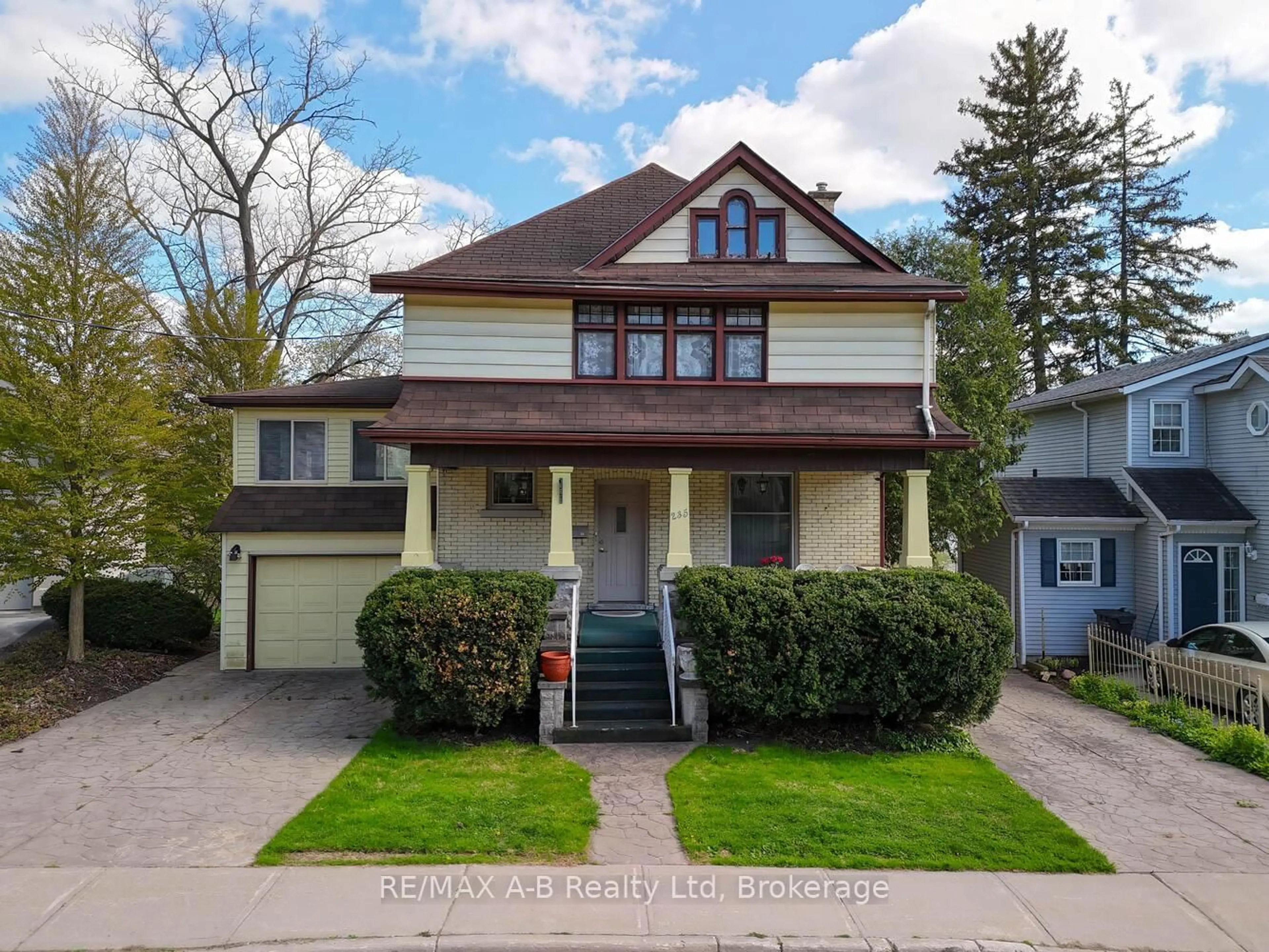 Home with vinyl exterior material, street for 235 William St, Stratford Ontario N5A 4Y2