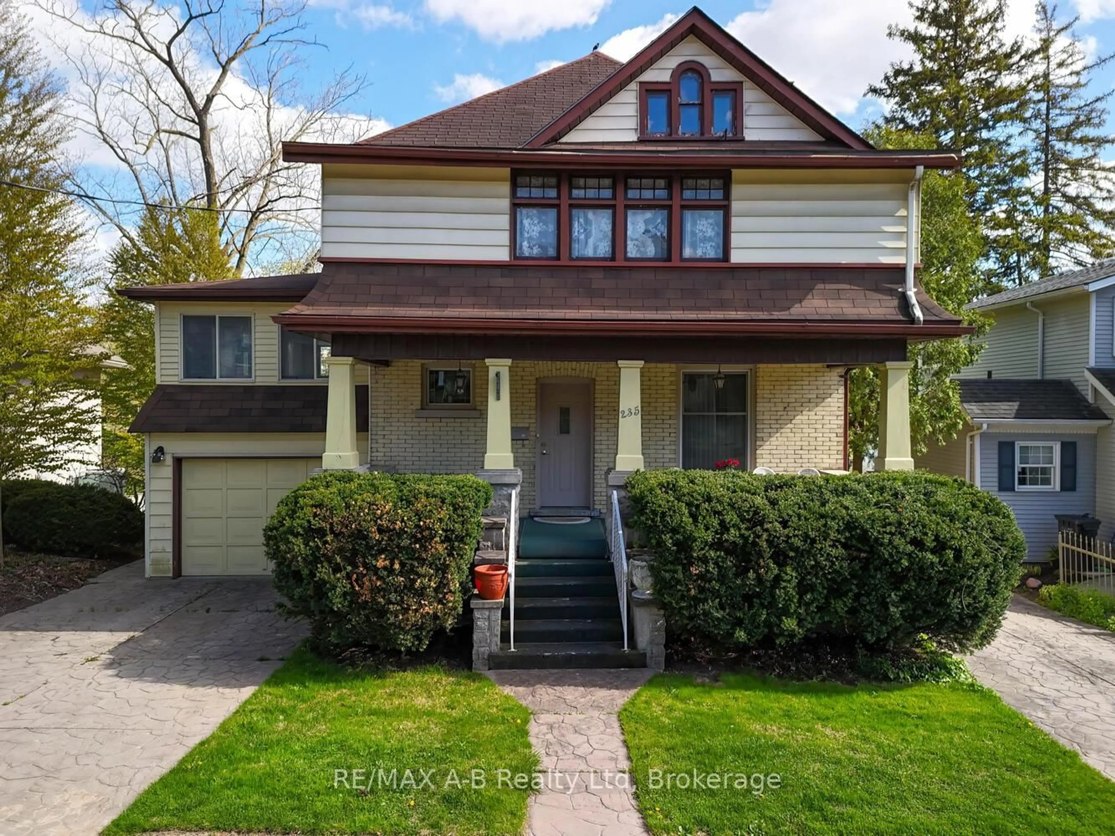 Home with vinyl exterior material, street for 235 William St, Stratford Ontario N5A 4Y2