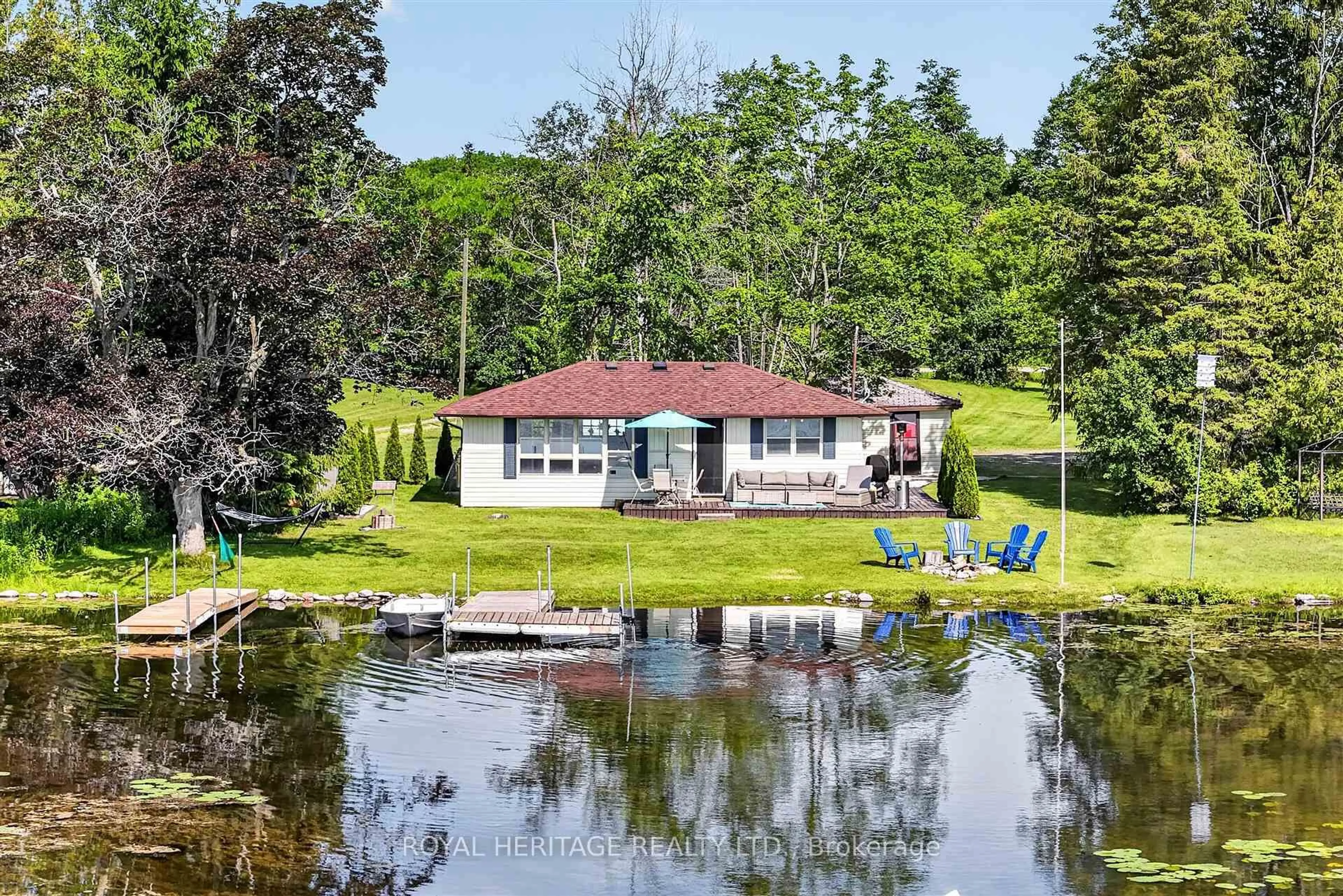 A pic from outside/outdoor area/front of a property/back of a property/a pic from drone, water/lake/river/ocean view for 100 Clearview Dr, Kawartha Lakes Ontario K0L 2W0